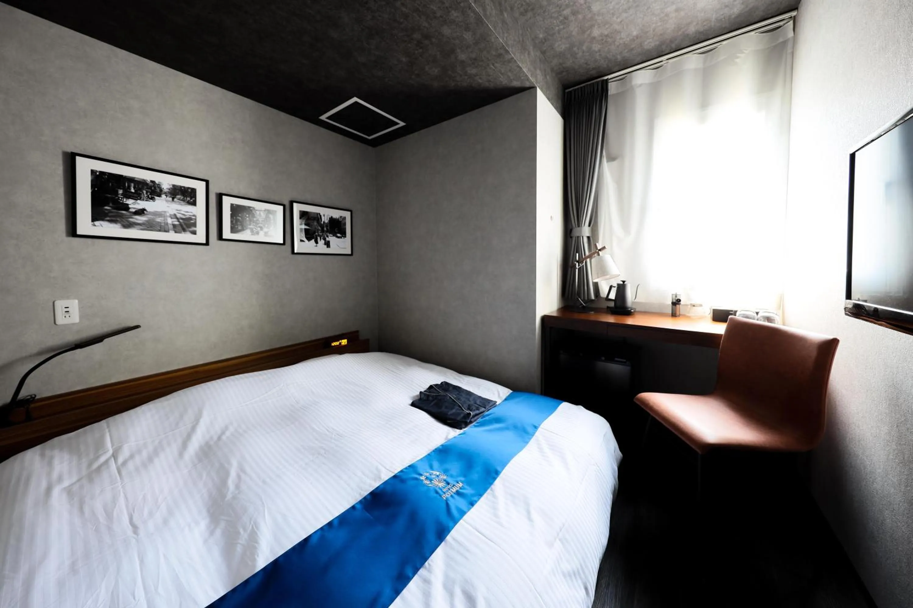 Photo of the whole room, Bed in Hotel Potmum Sapporo