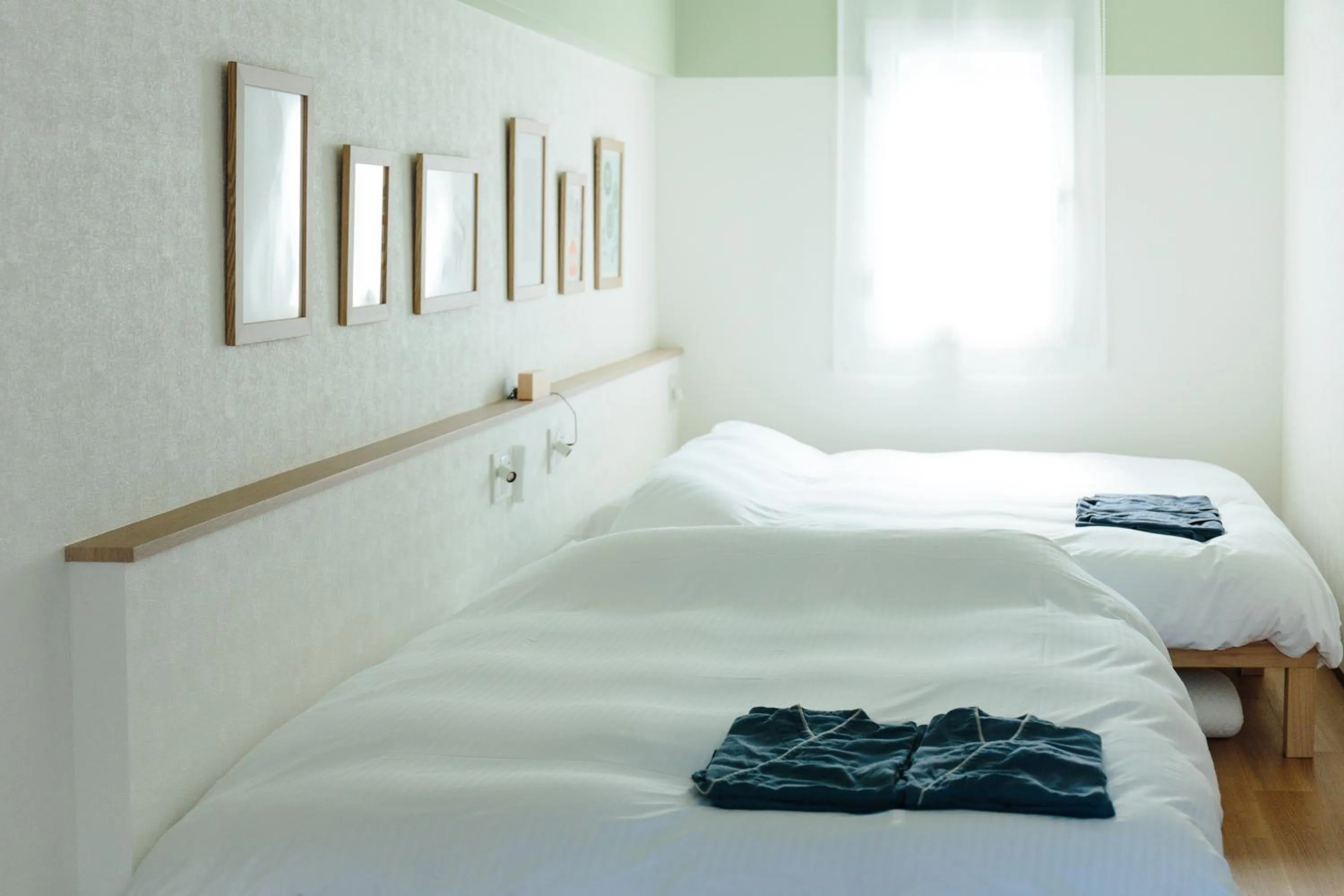 Bed in Hotel Potmum Sapporo