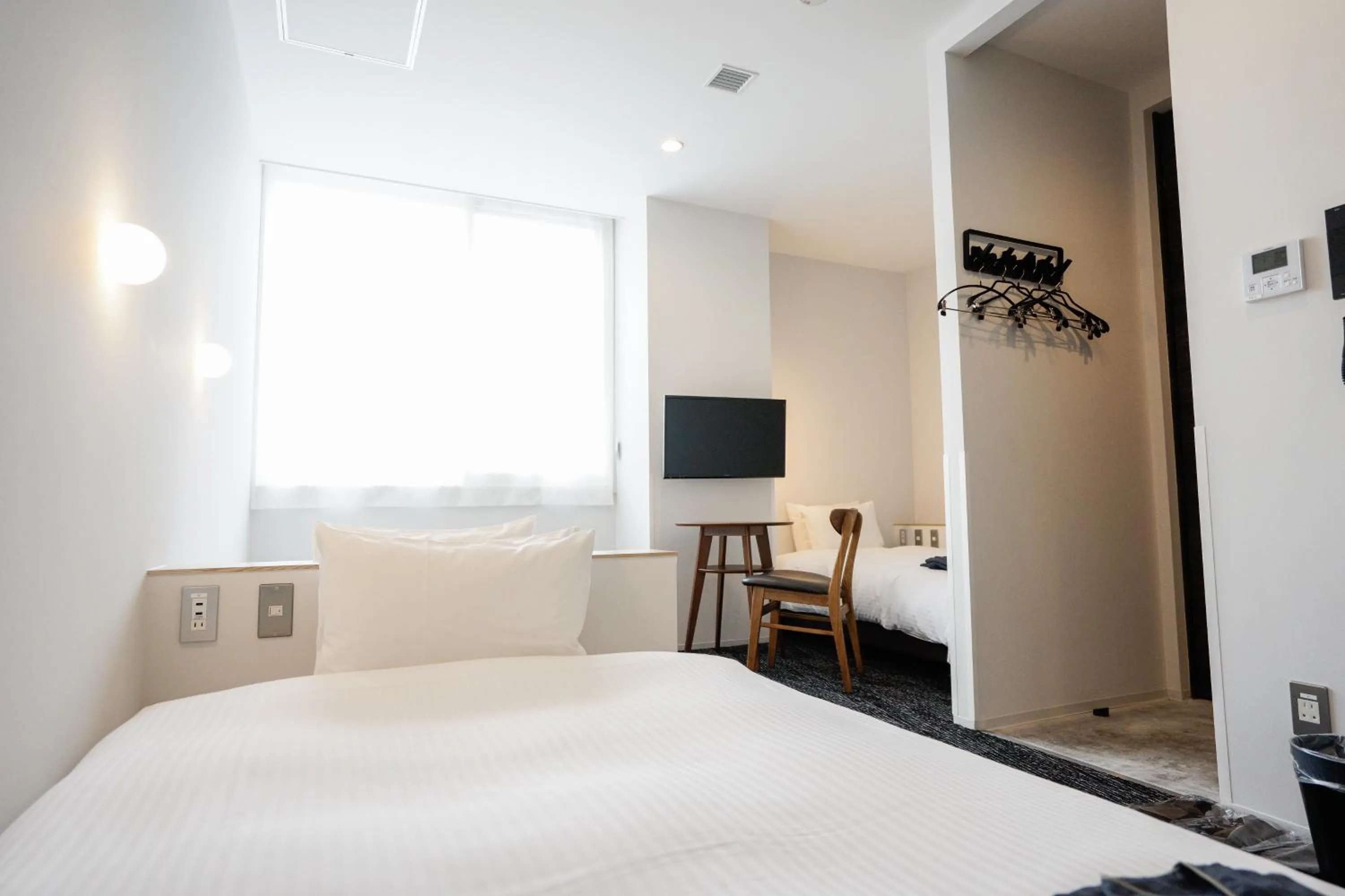 Photo of the whole room, Bed in Hotel Potmum Sapporo