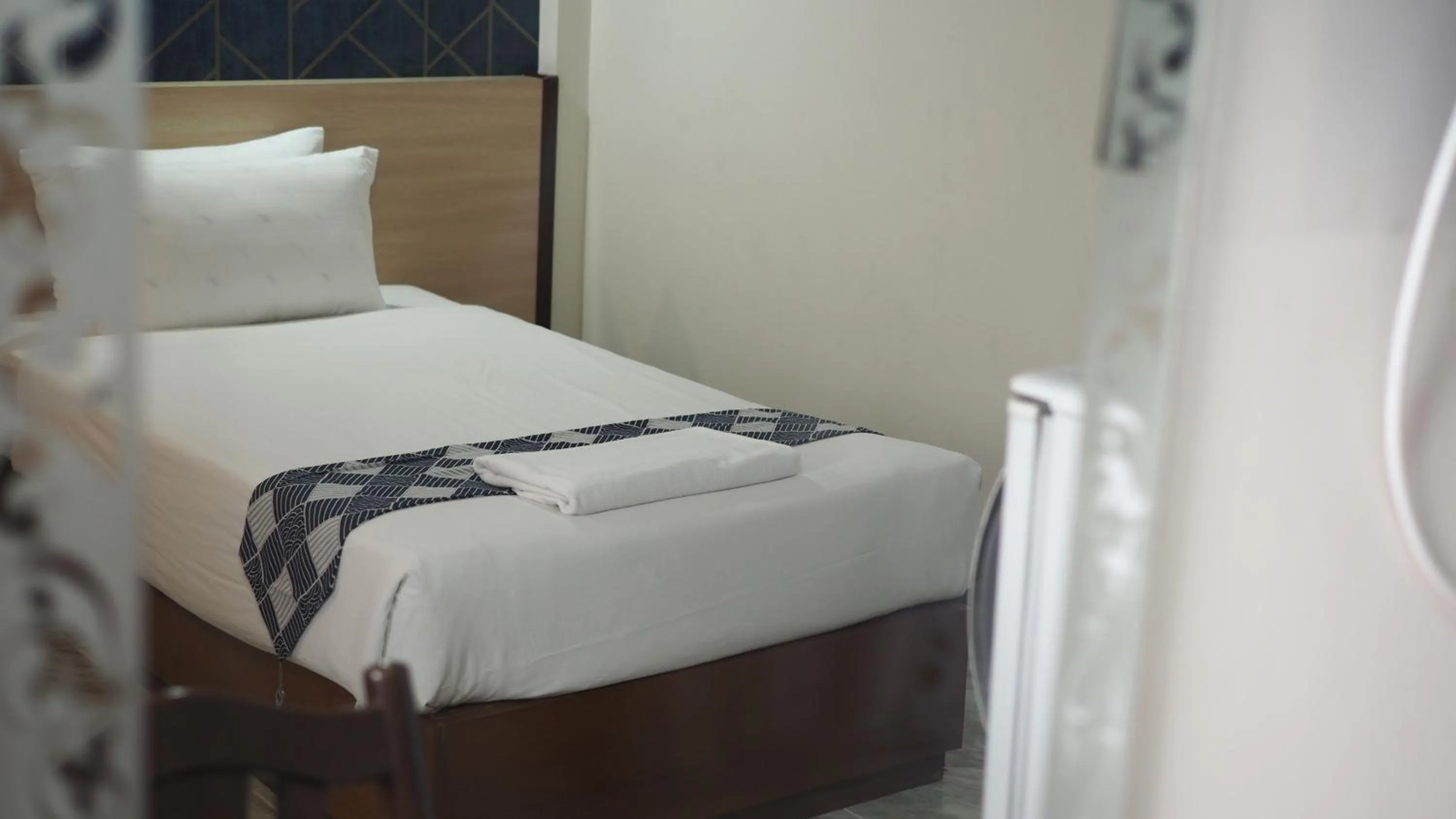 Bed in Luckswan Boutique Chiang Rai - SHA Extra Plus