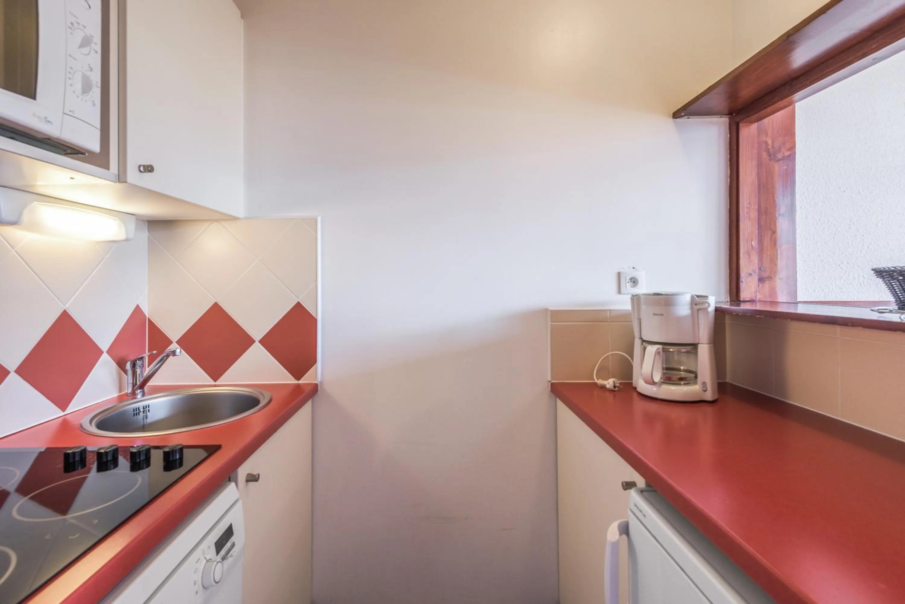 Kitchen or kitchenette in Residence Les Fontaines Blanches - maeva Home
