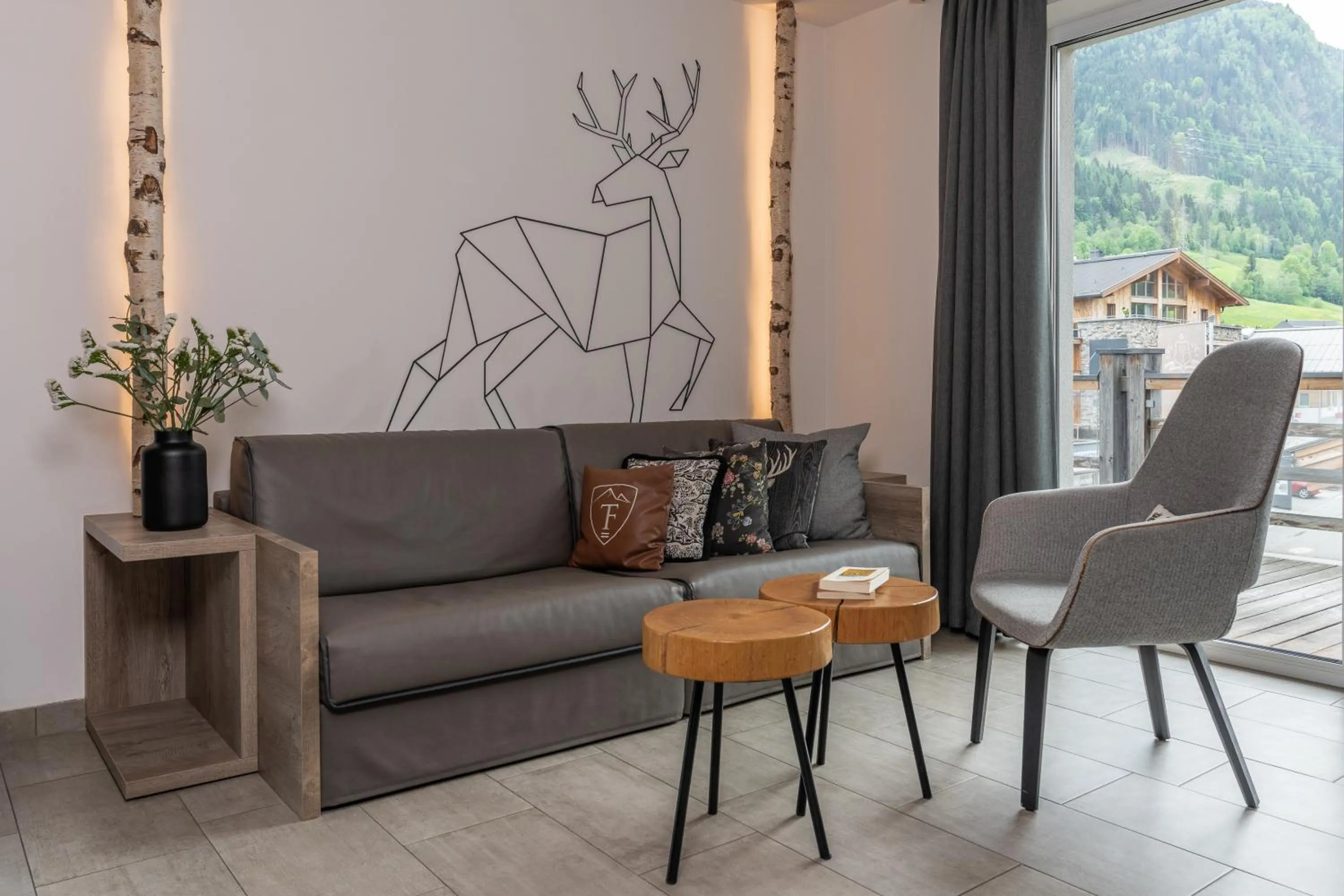 Seating area in 24 by AvenidA - Mountain Hotel