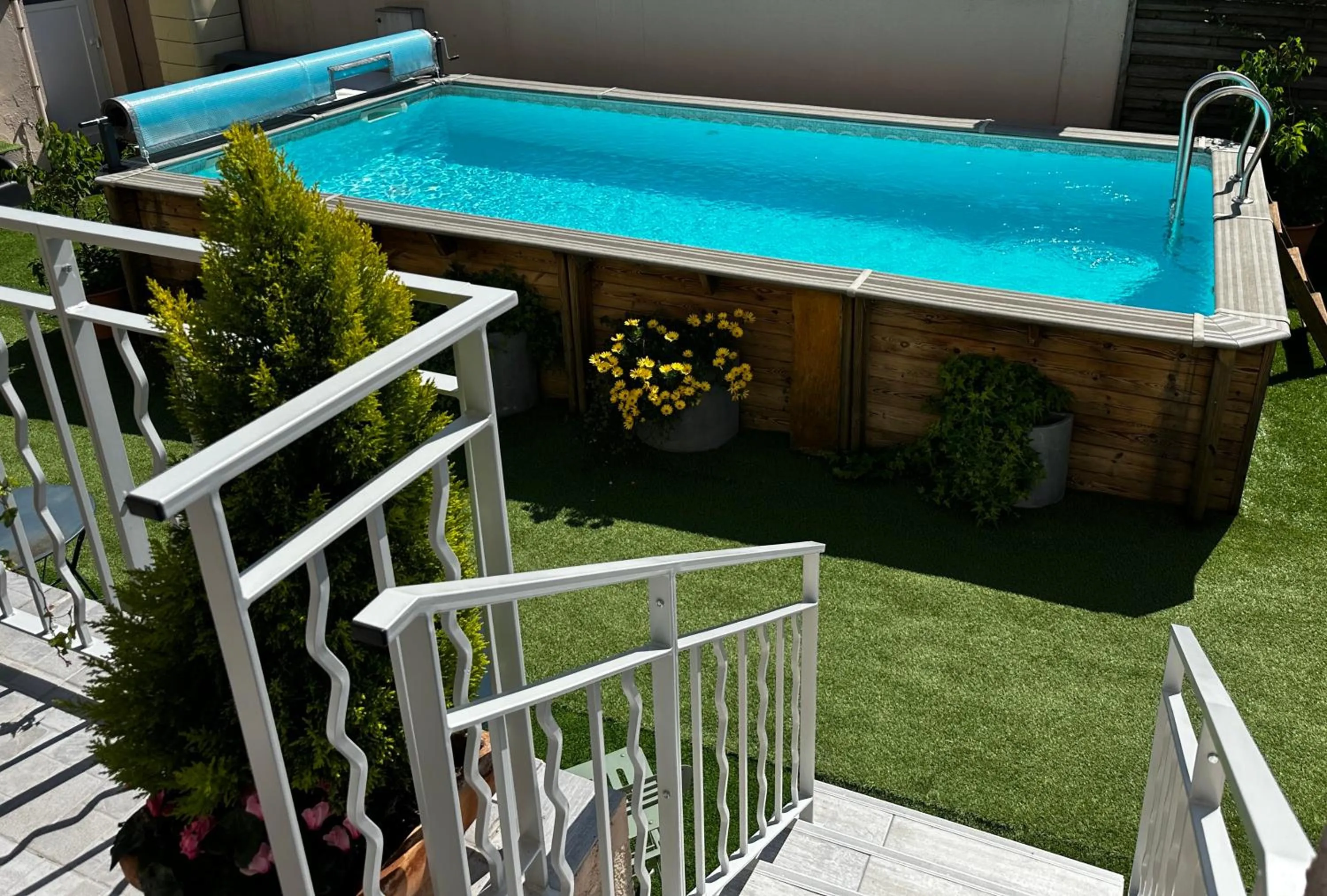 Swimming pool in Logis Le Passiflore Cognac