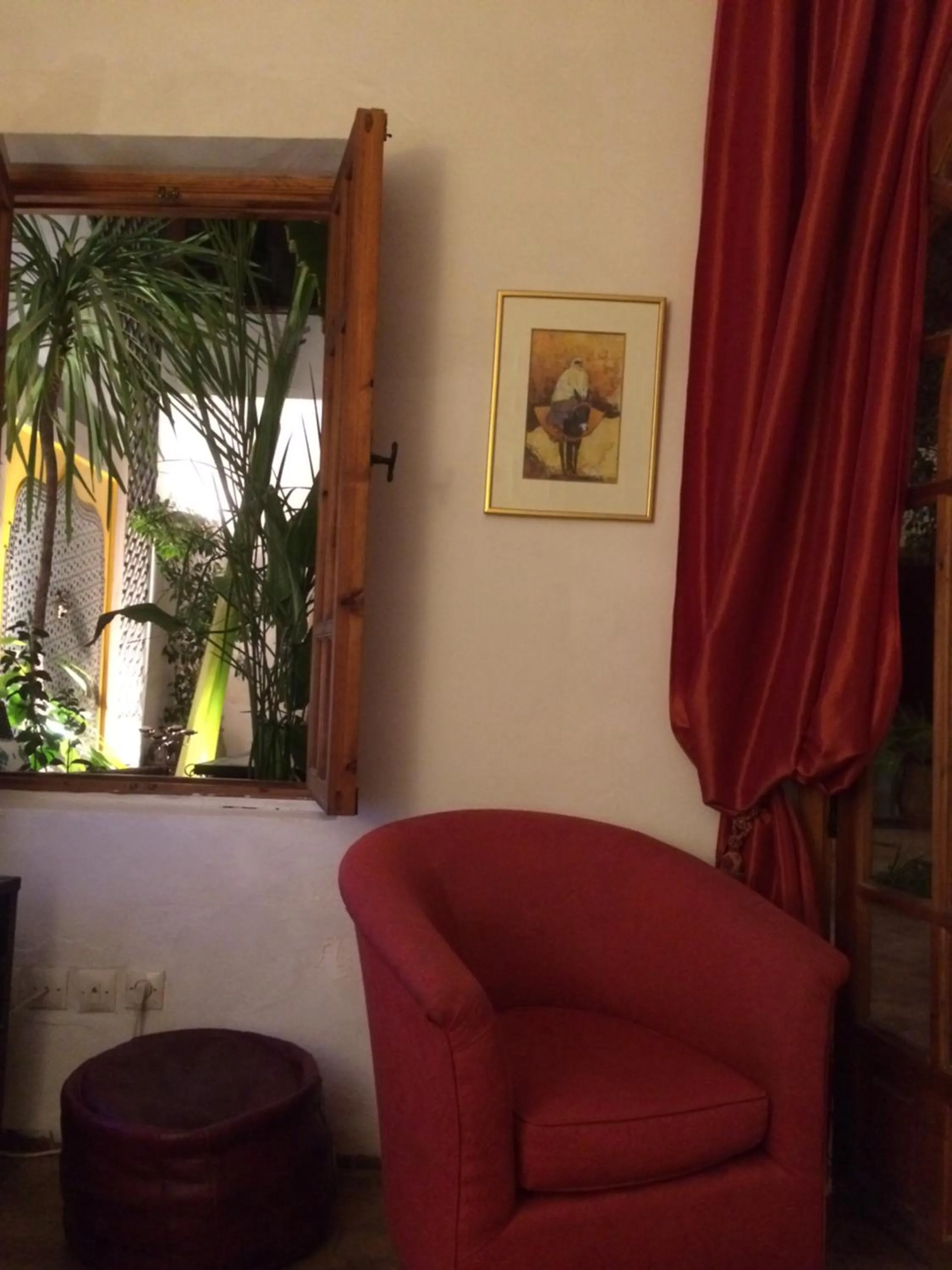 Communal lounge/ TV room in Riad Irene