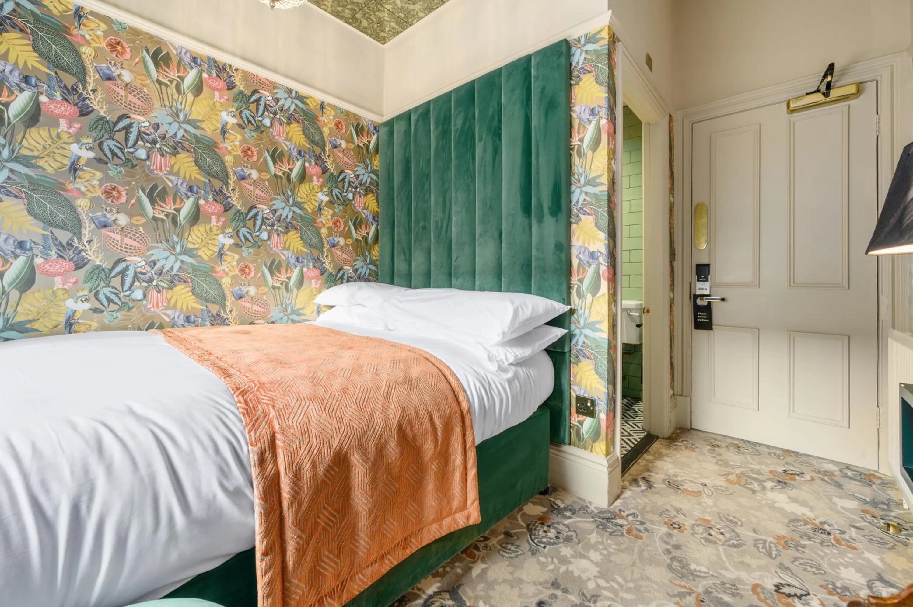 Bed in Clementine's Guest House