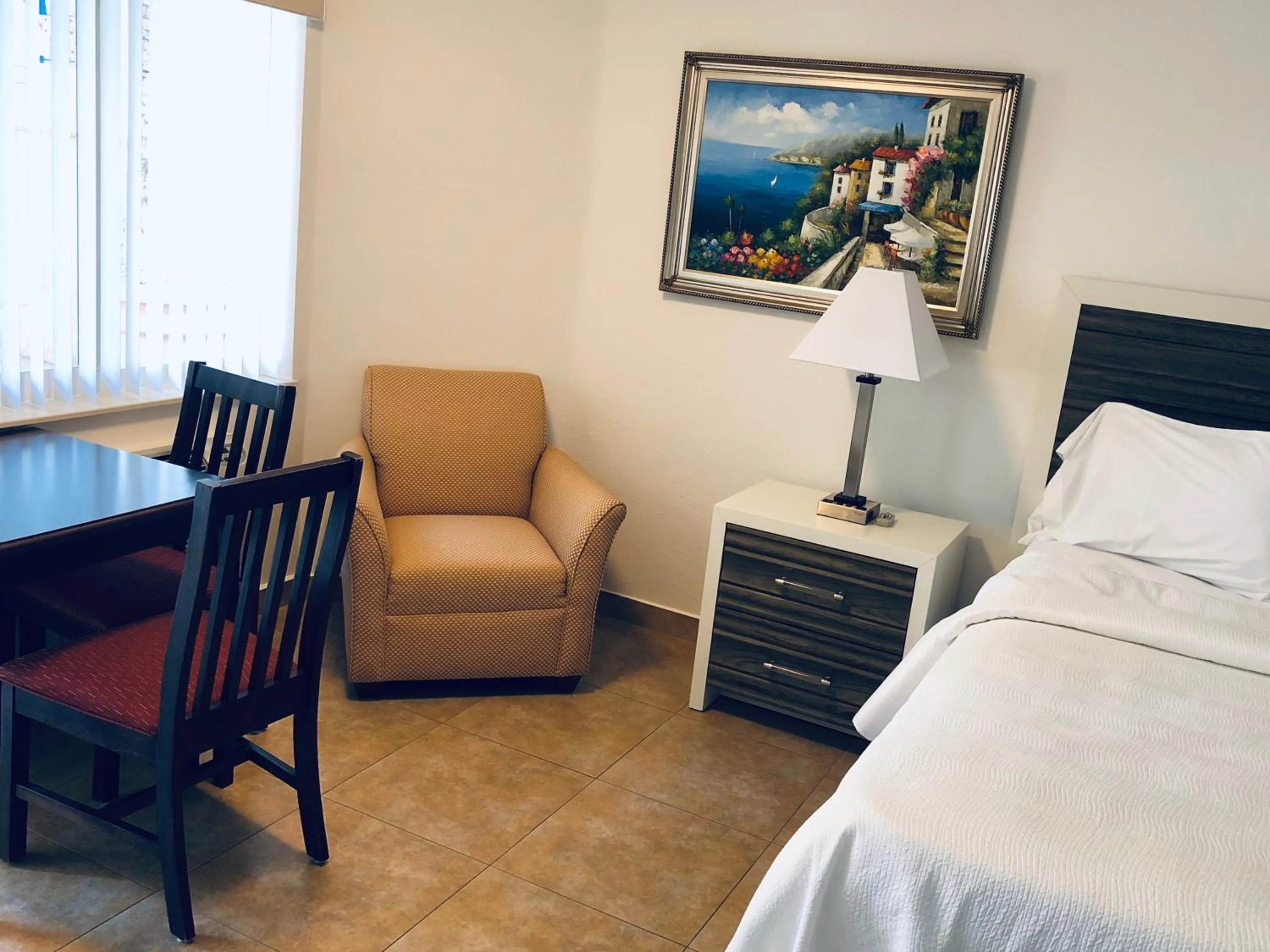 Seating area, Bed in Surf Side Resort