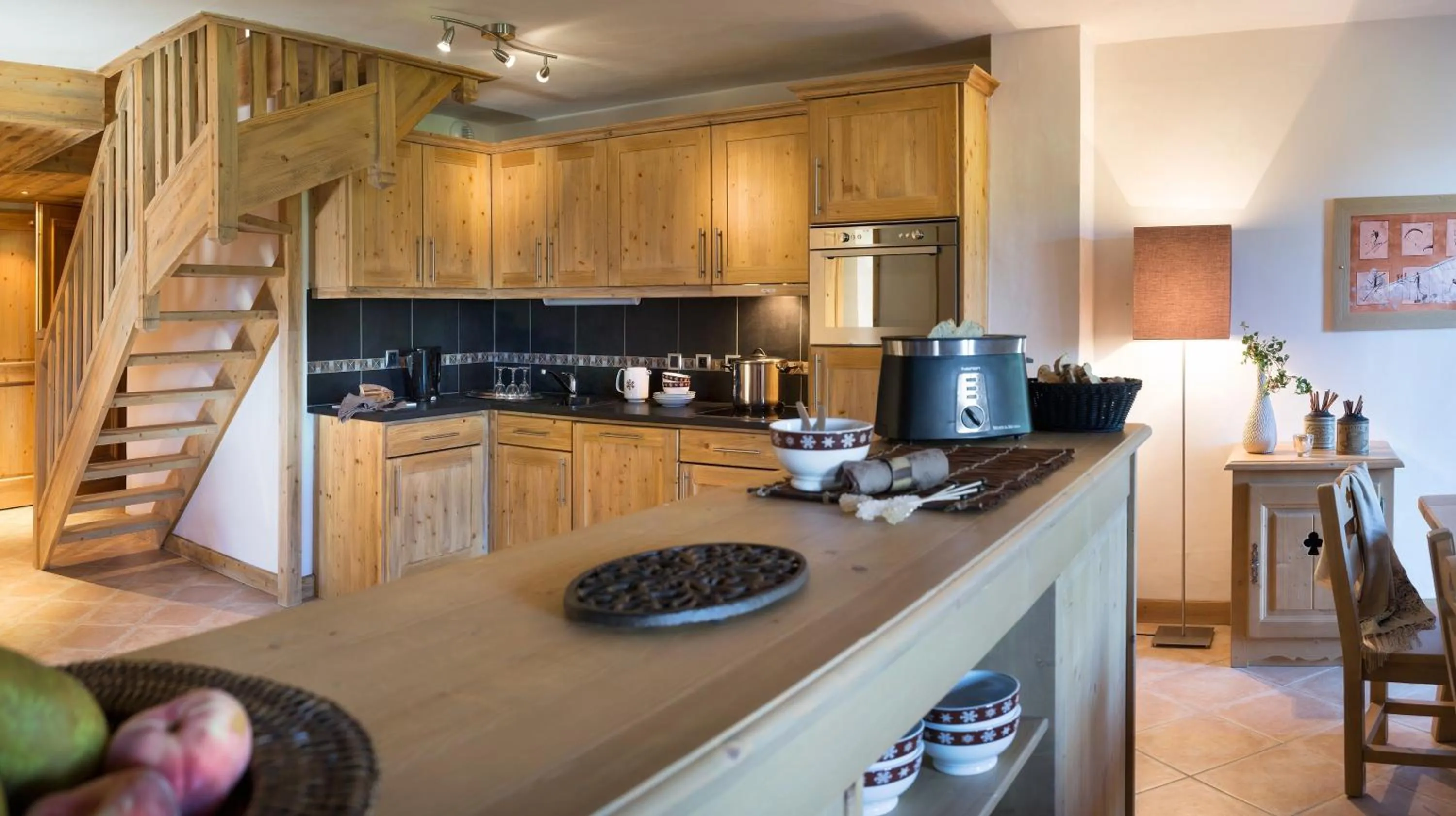 Kitchen or kitchenette in CGH Résidences & Spas Le Village De Lessy