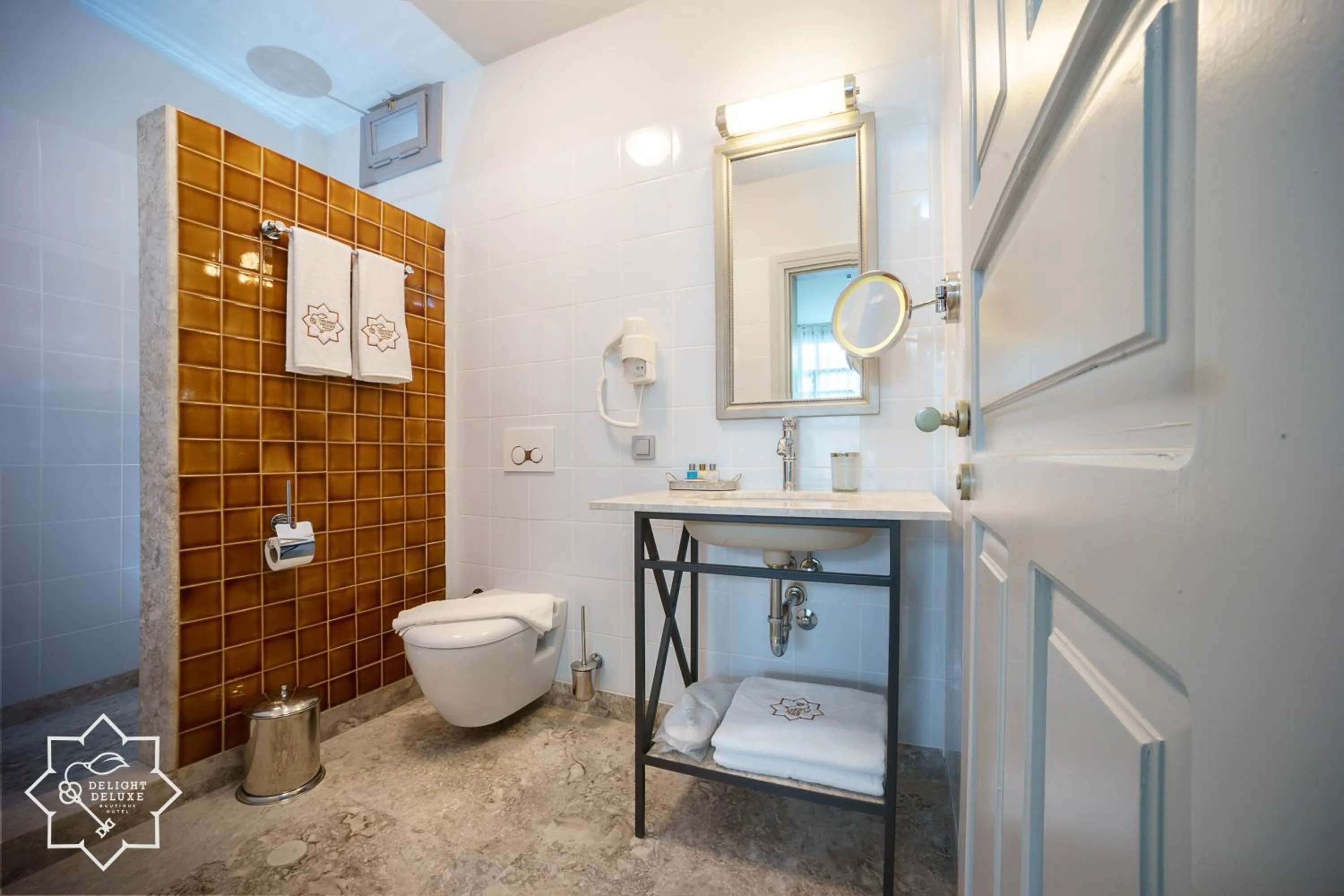 Bathroom in Delight Deluxe Hotel