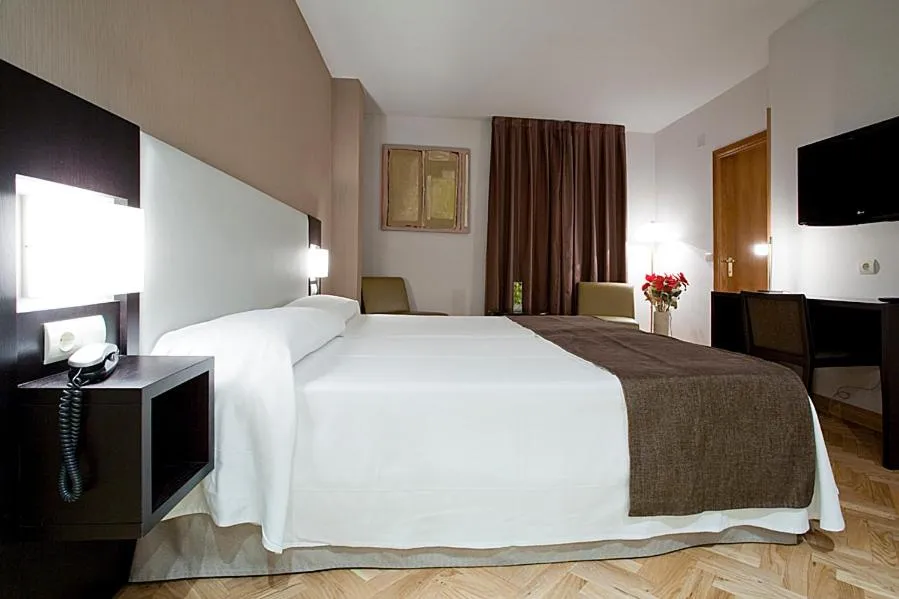 Bed in Hostal Carlos III