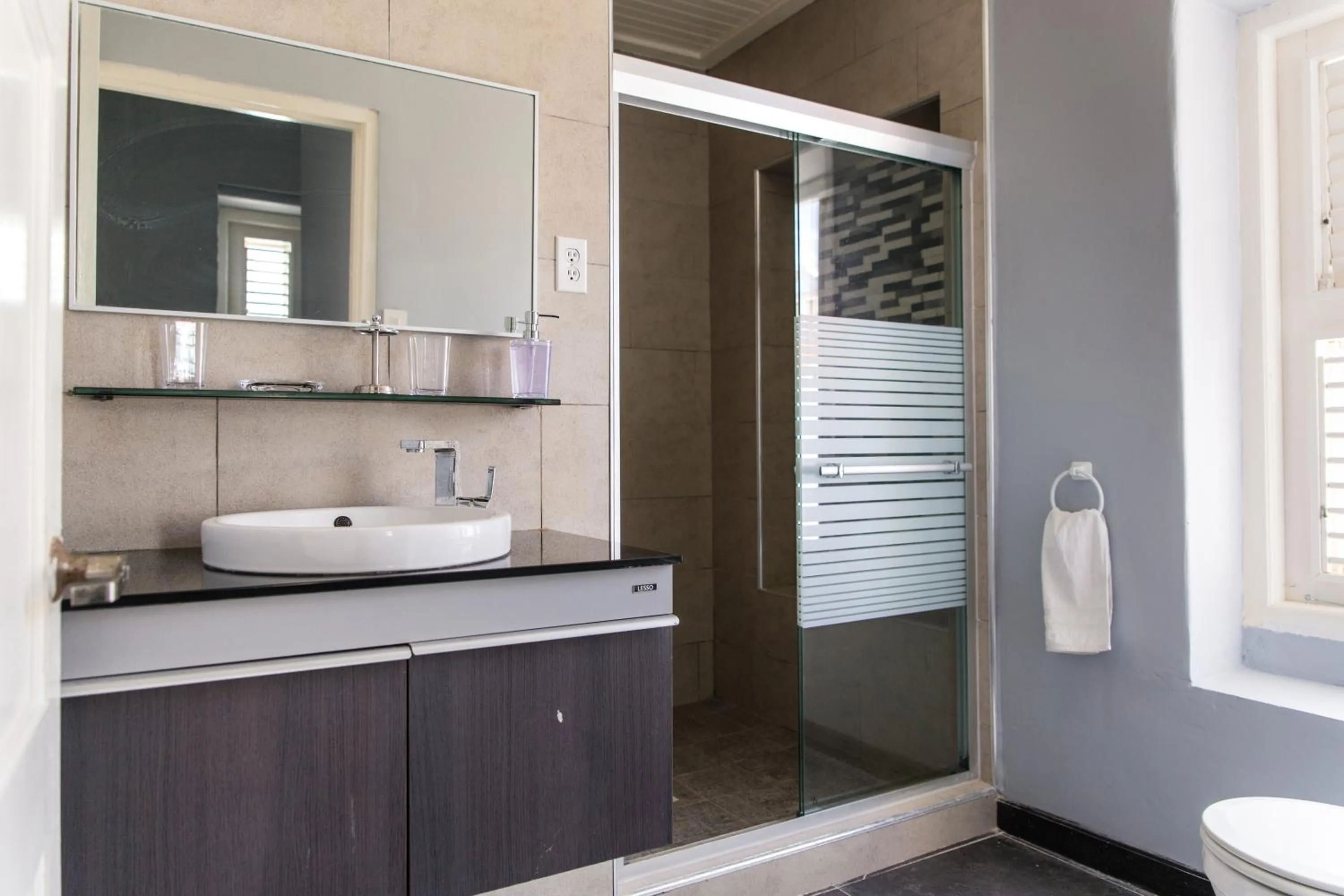 Bathroom in Bario Hotel