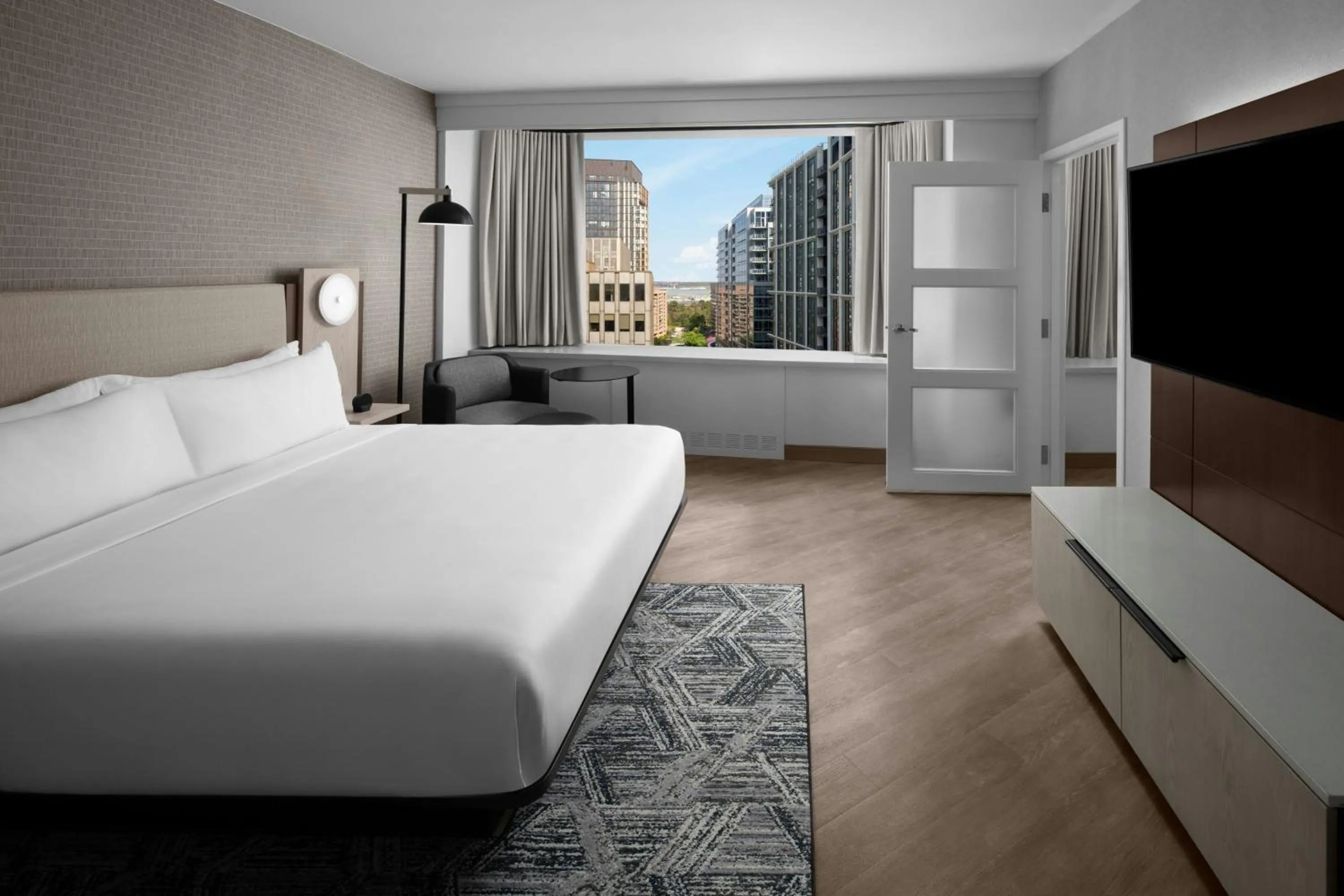 Photo of the whole room, Bed in AC Hotel Arlington National Landing