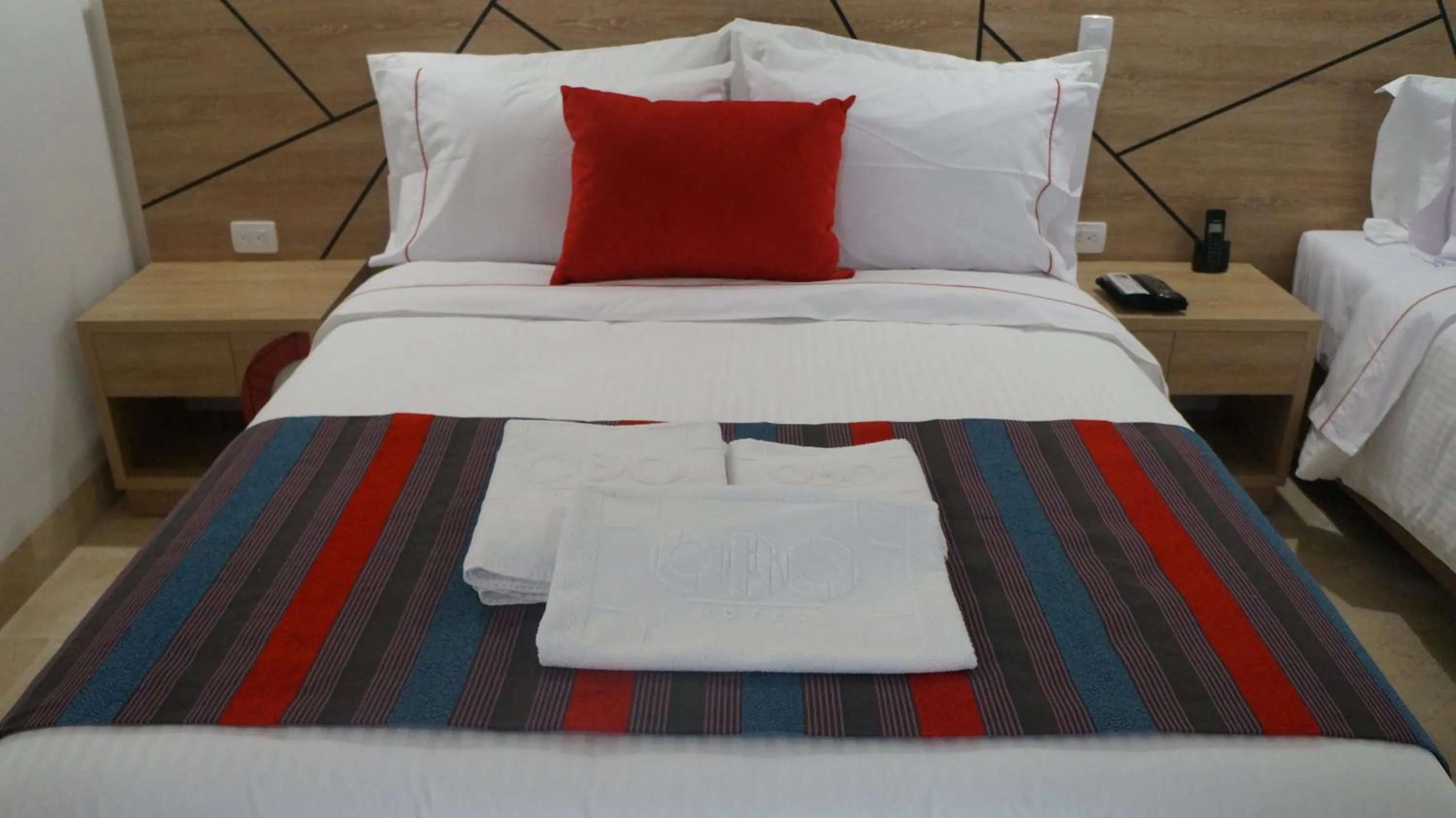 Bed in Obo Hotel