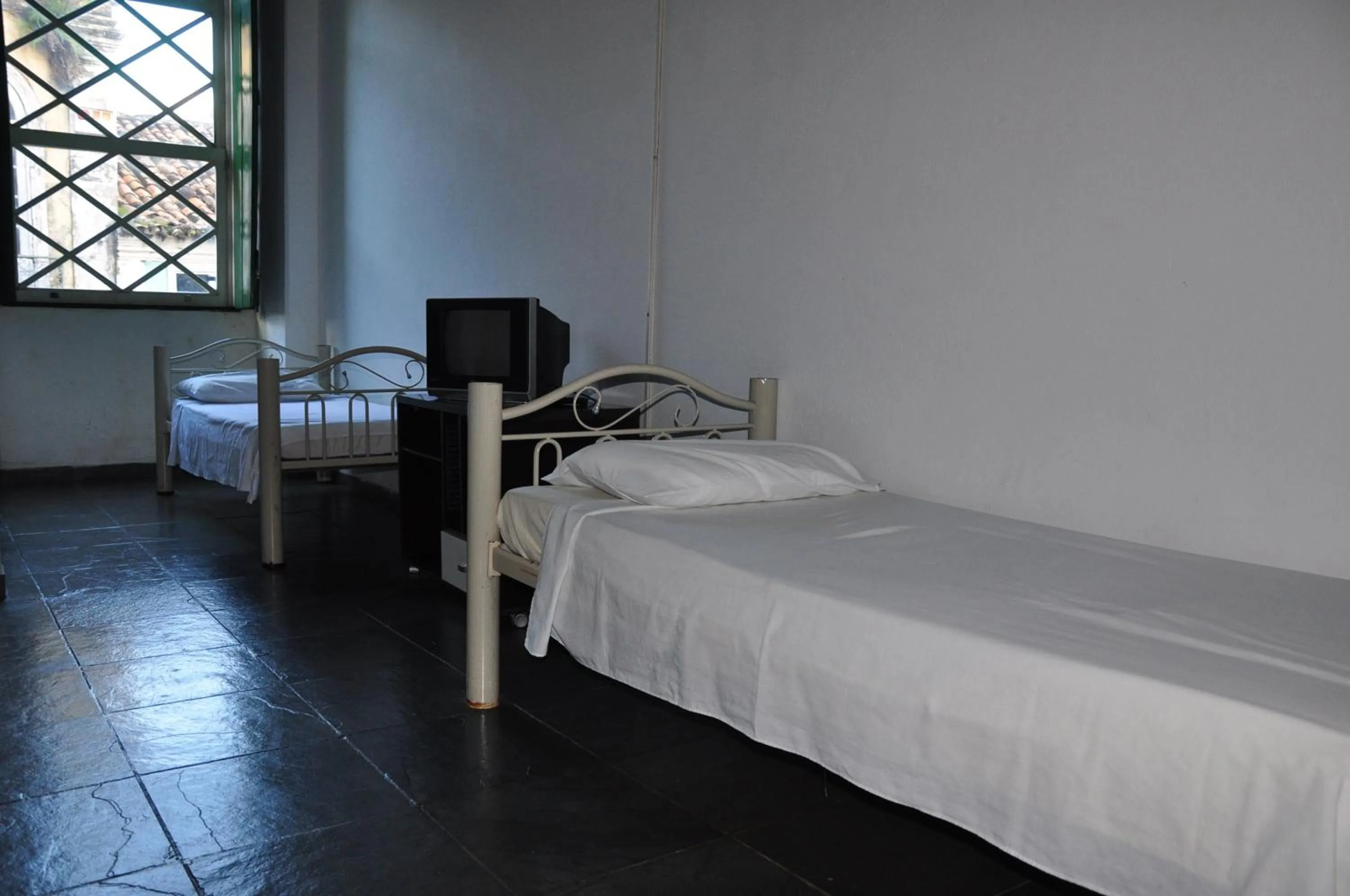 Bed in Pousada Solar dos Romanos