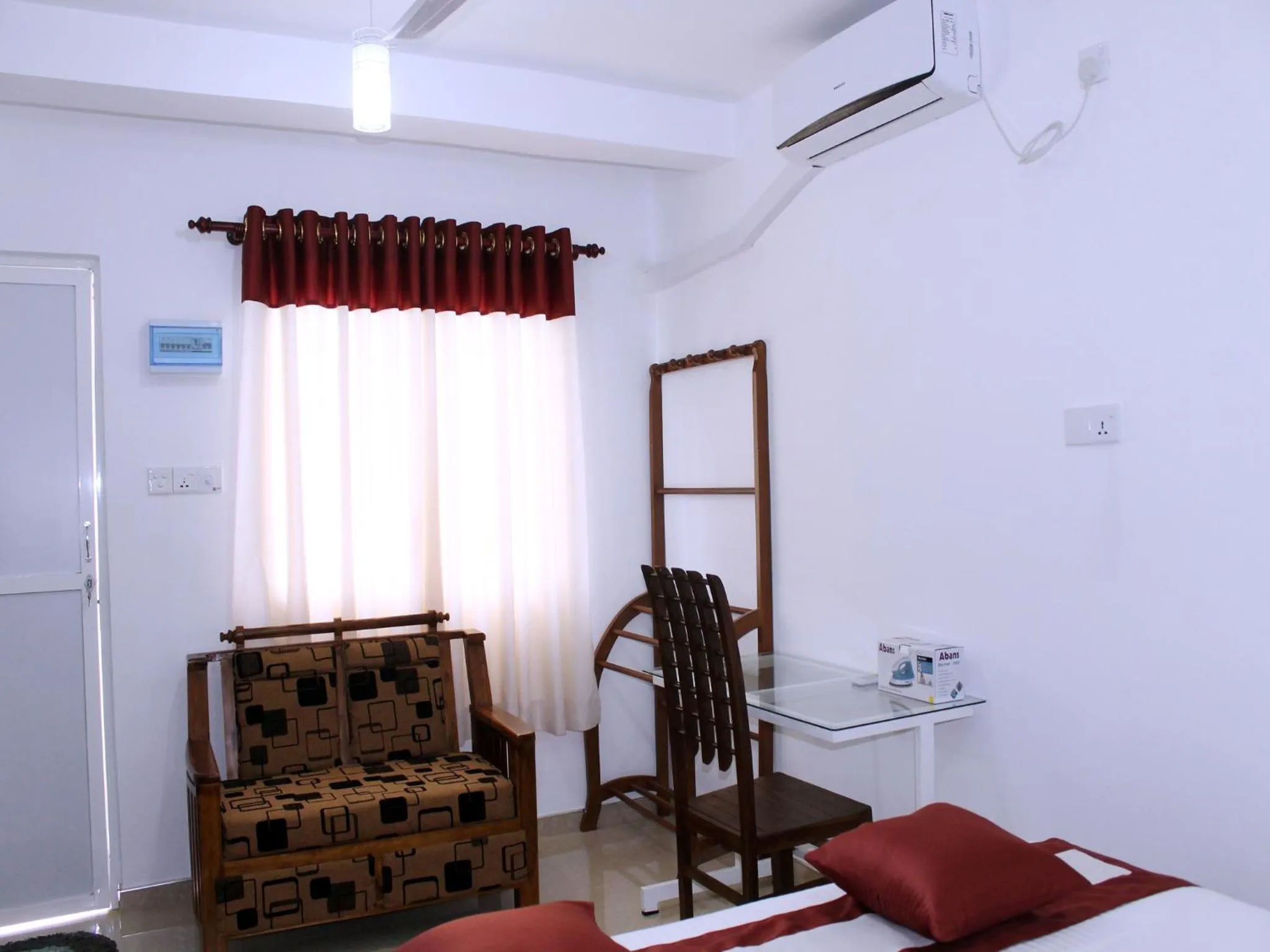 Seating area, Bed in Elliot Nature Resort