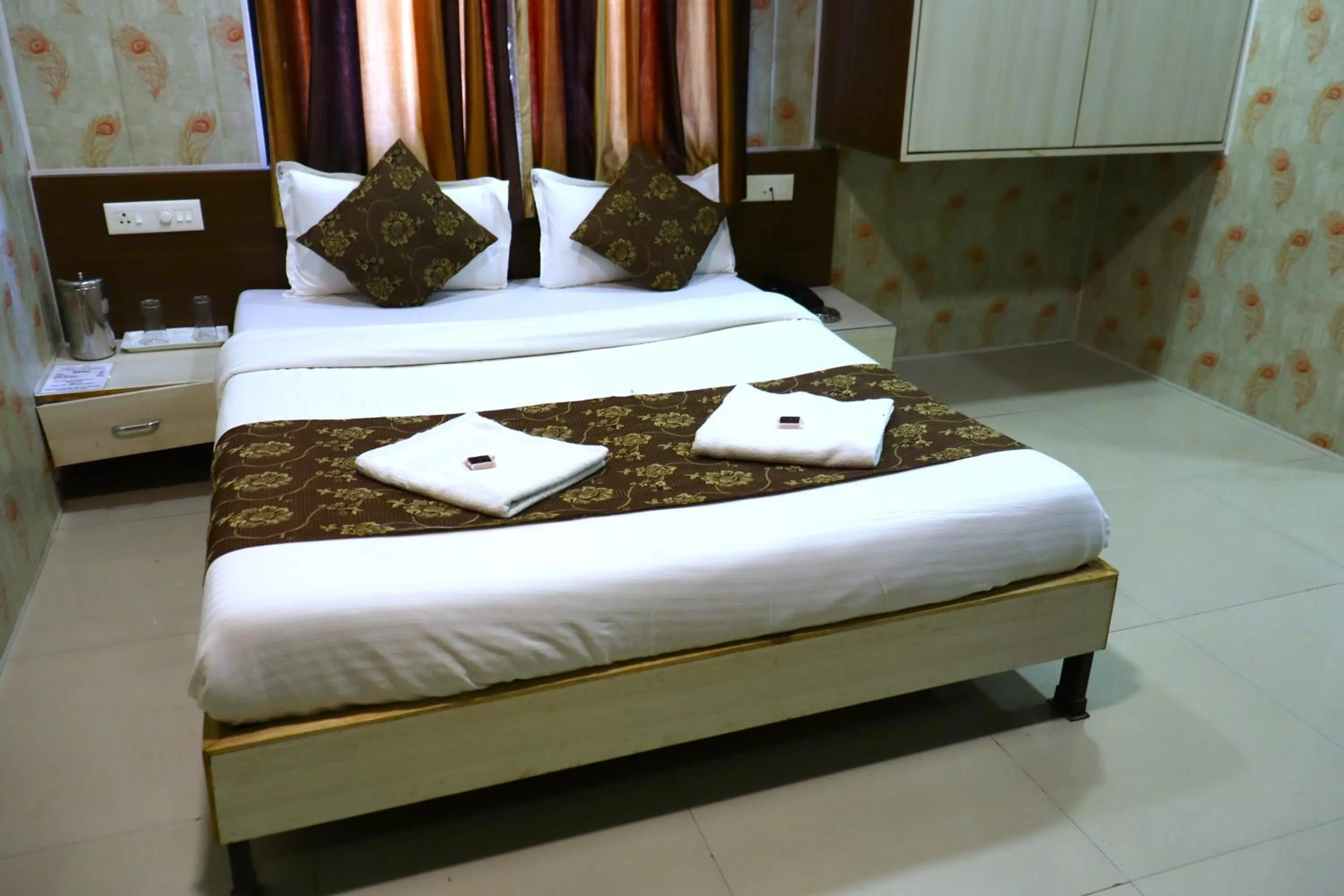 Bed in Hotel Midtown Inn