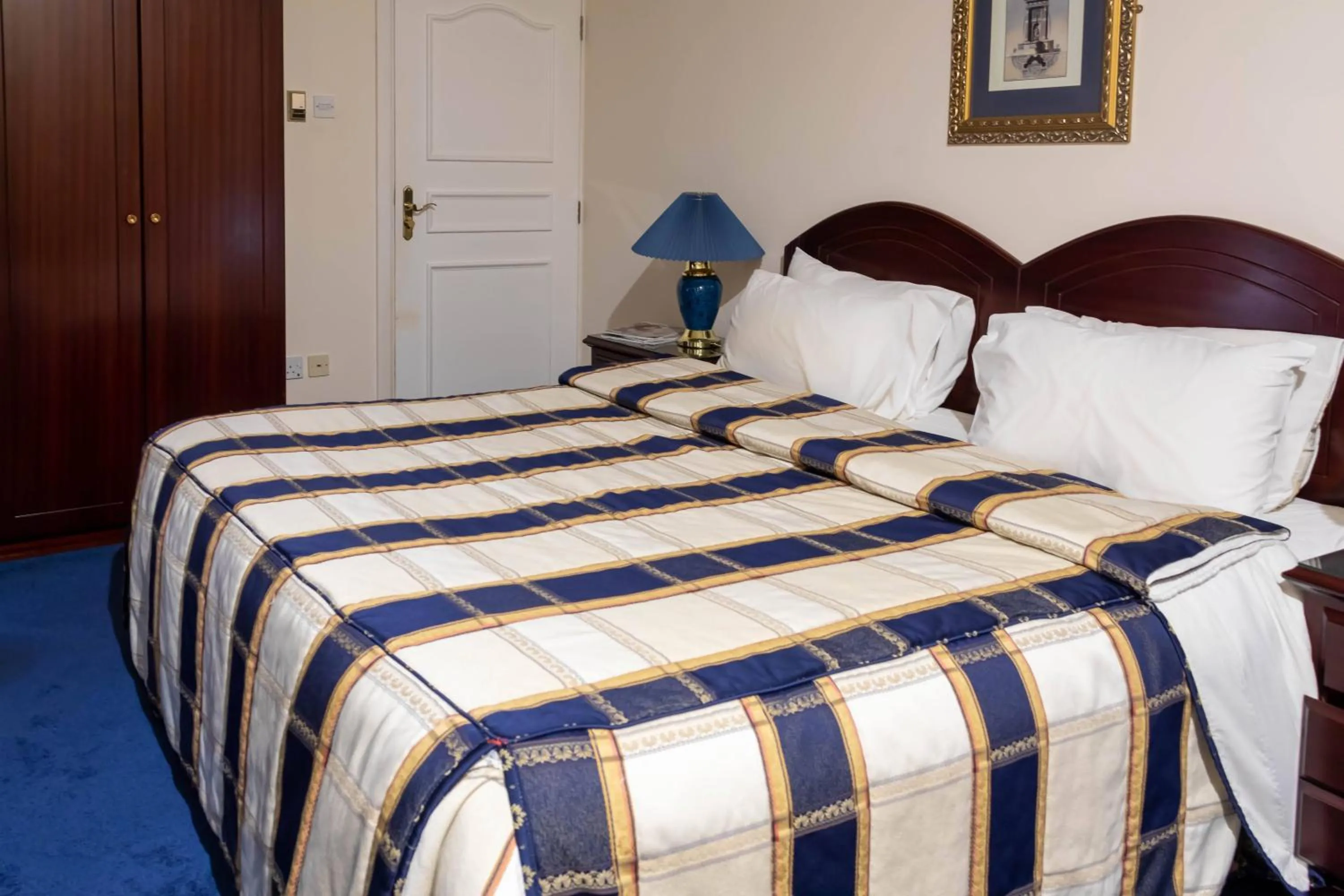 Bed in Mansouri Mansions Hotel