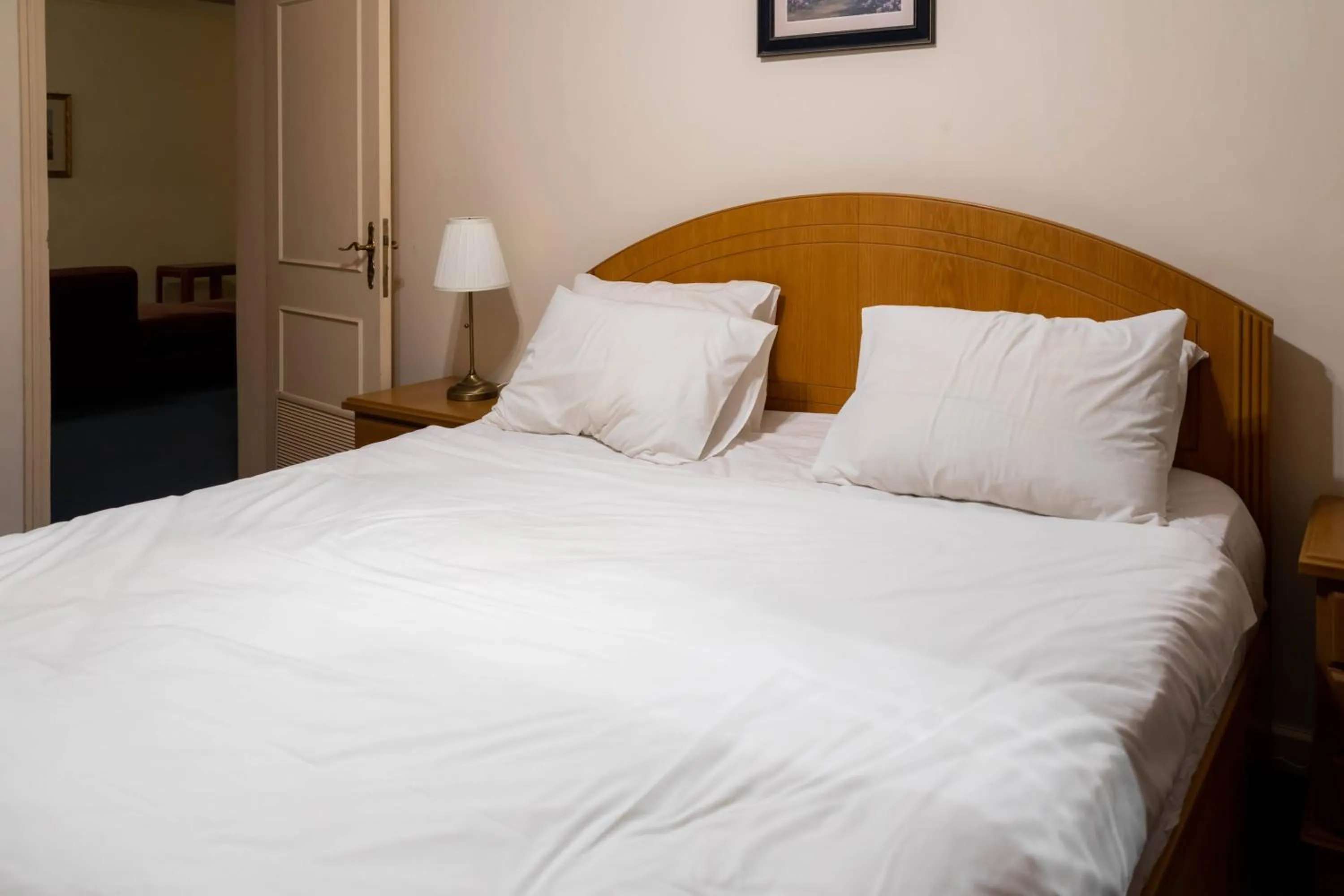 Bed in Mansouri Mansions Hotel