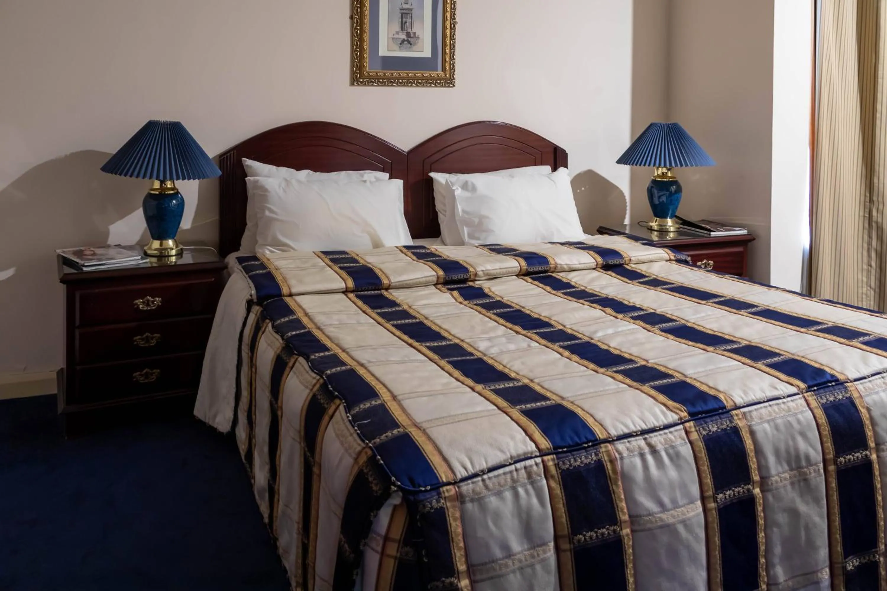 Bed in Mansouri Mansions Hotel