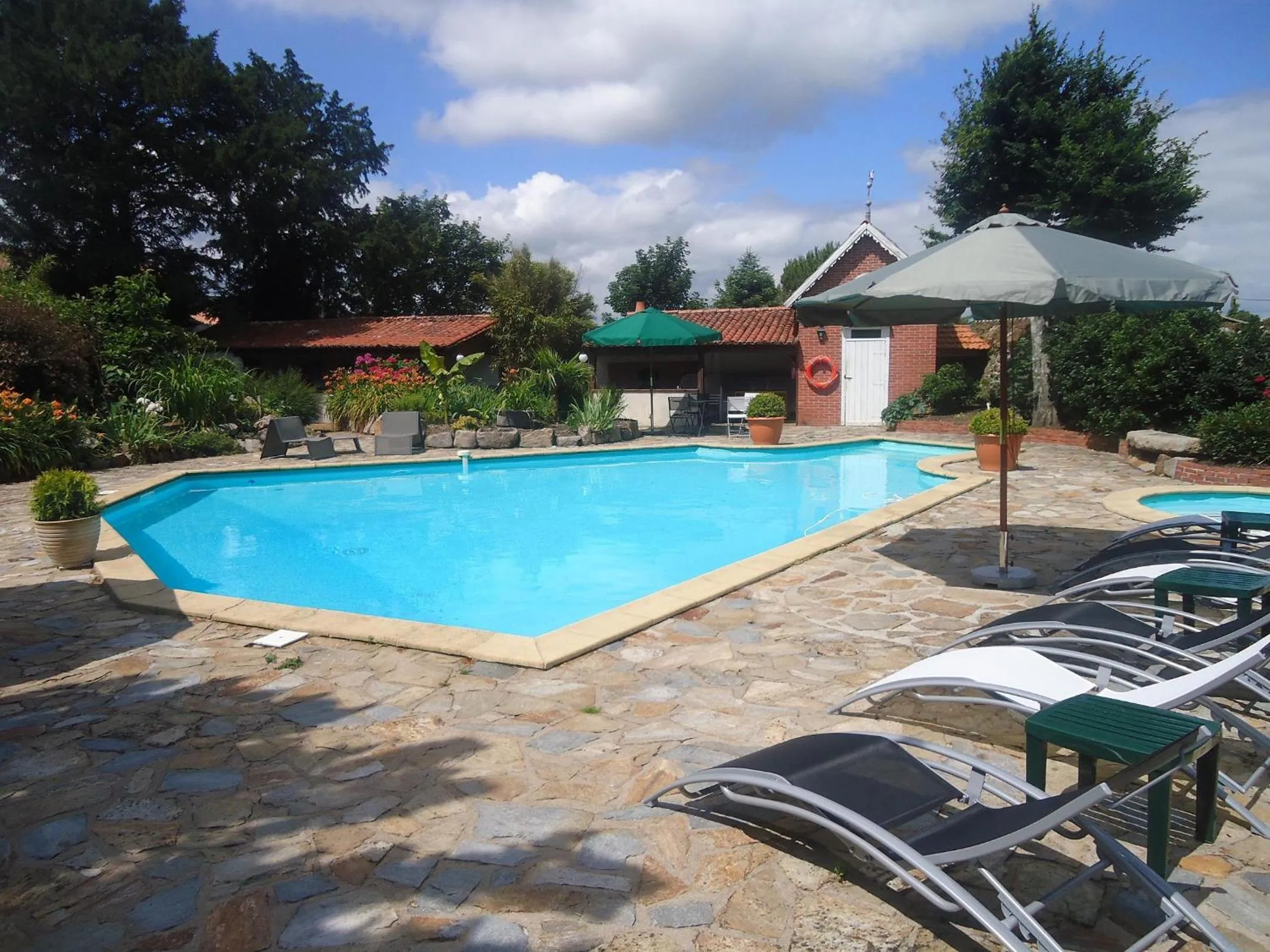 Swimming pool in Hôtel De La Barbacane
