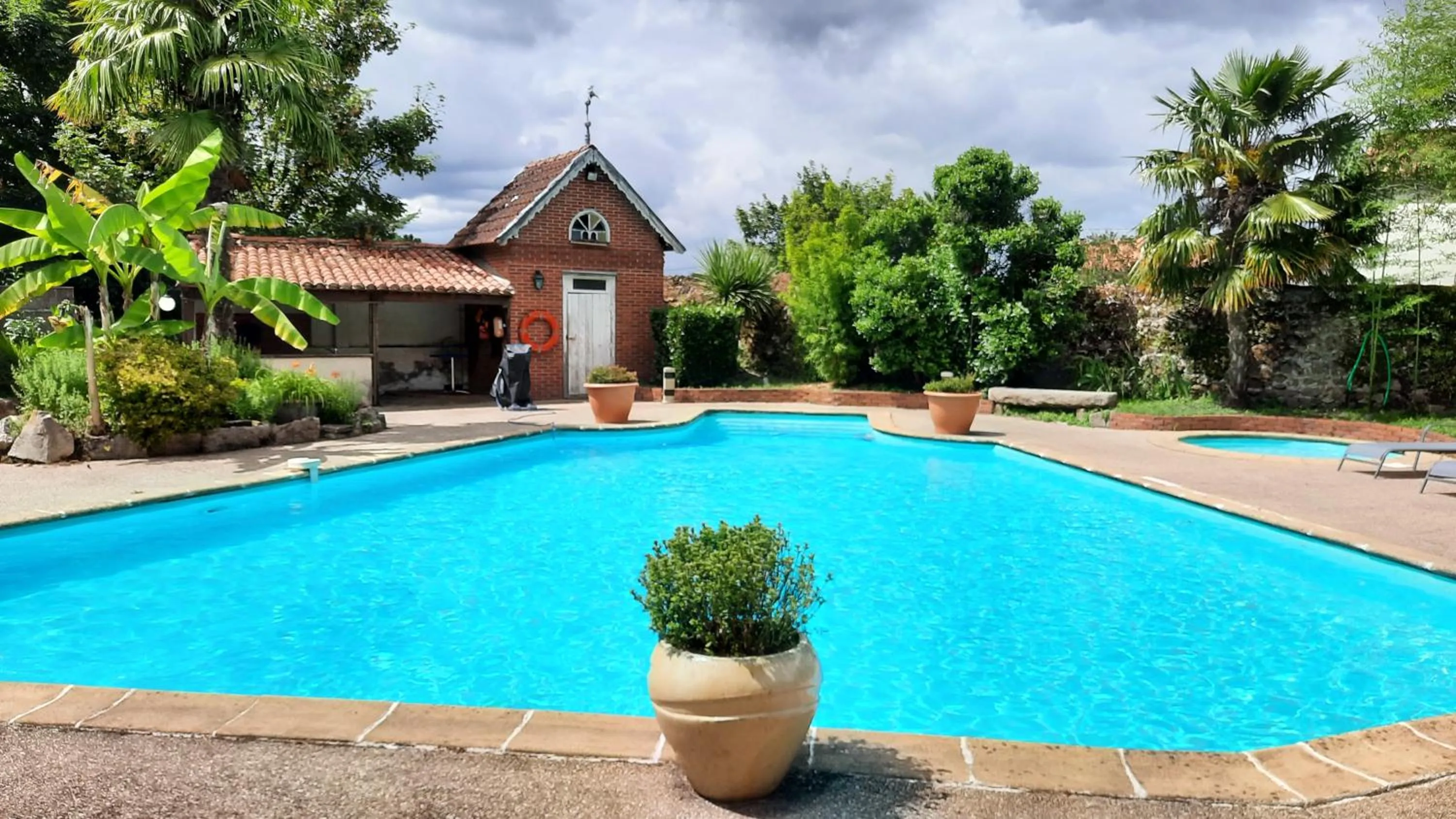 Swimming pool in Hôtel De La Barbacane