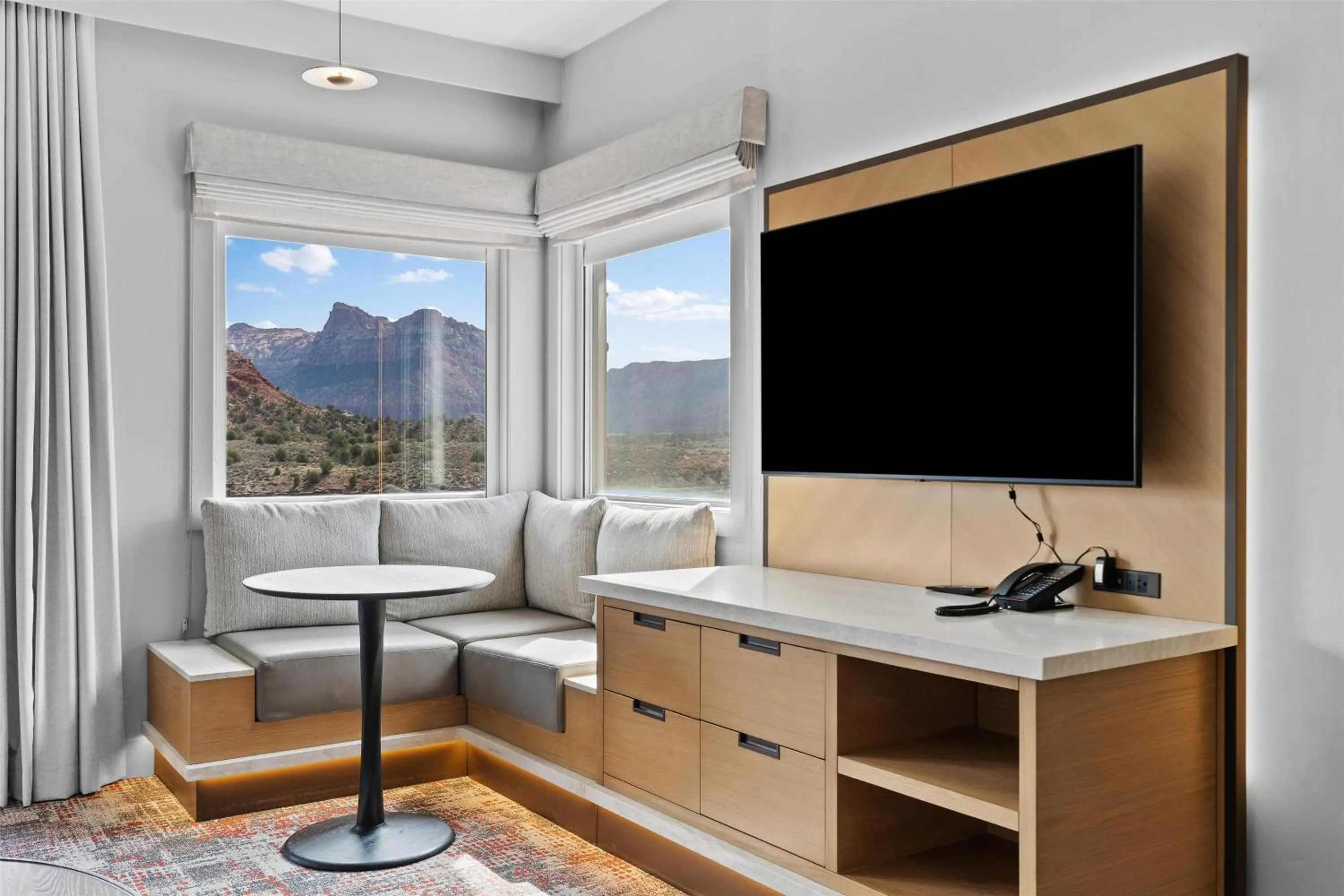 Living room in Hotel De Novo Springdale, Tapestry Collection by Hilton