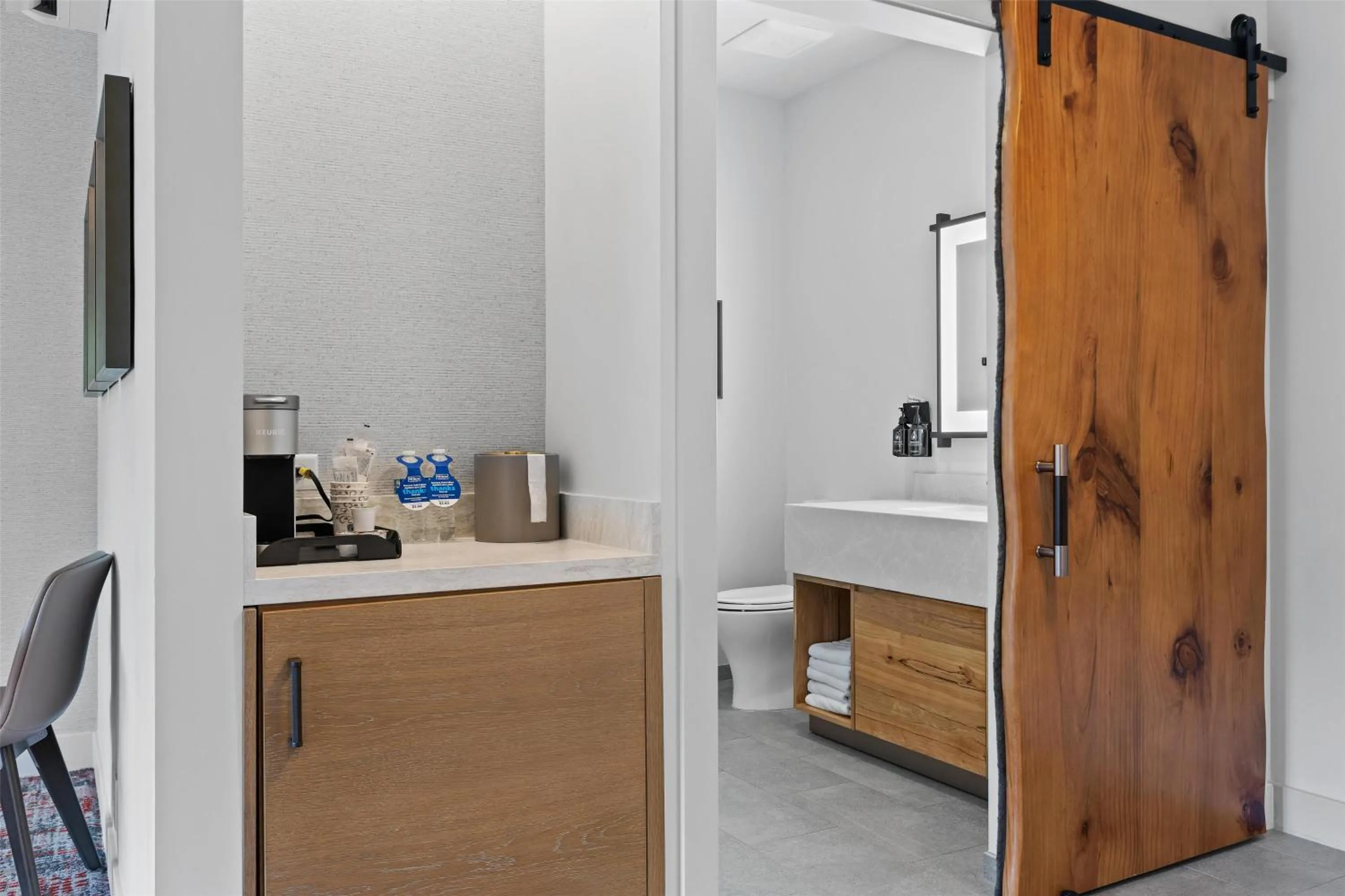 Bathroom in Hotel De Novo Springdale, Tapestry Collection by Hilton