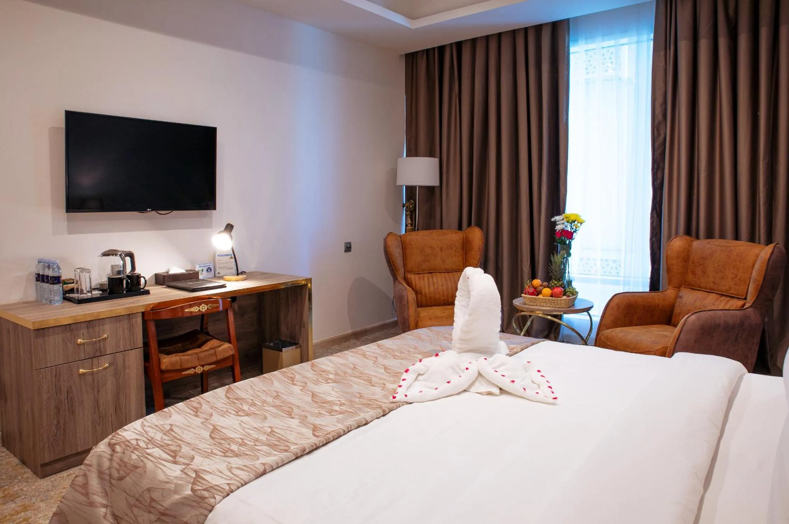 Bed in Al Mansour Plaza Hotel