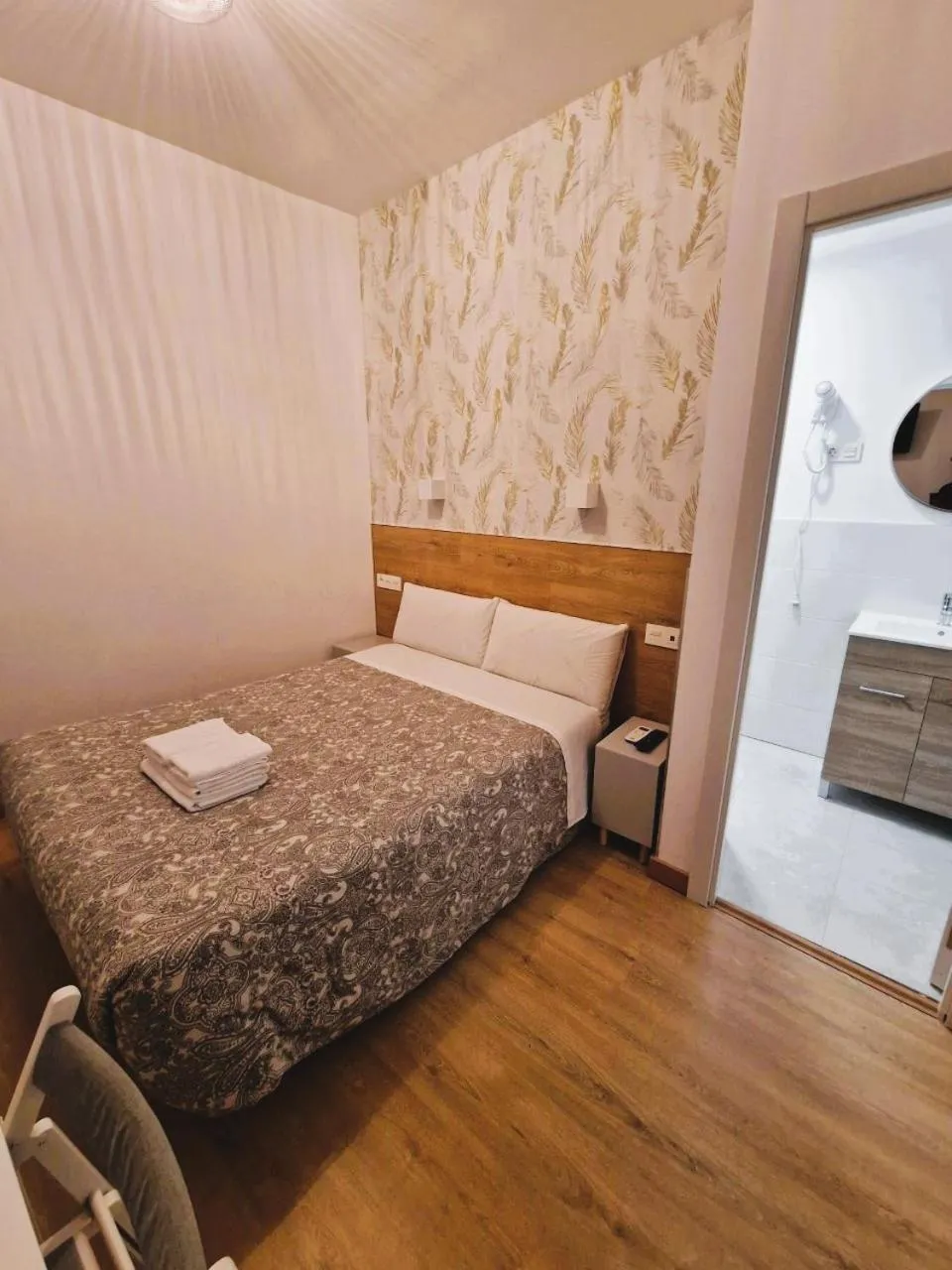 Bed in Hostal Comercial