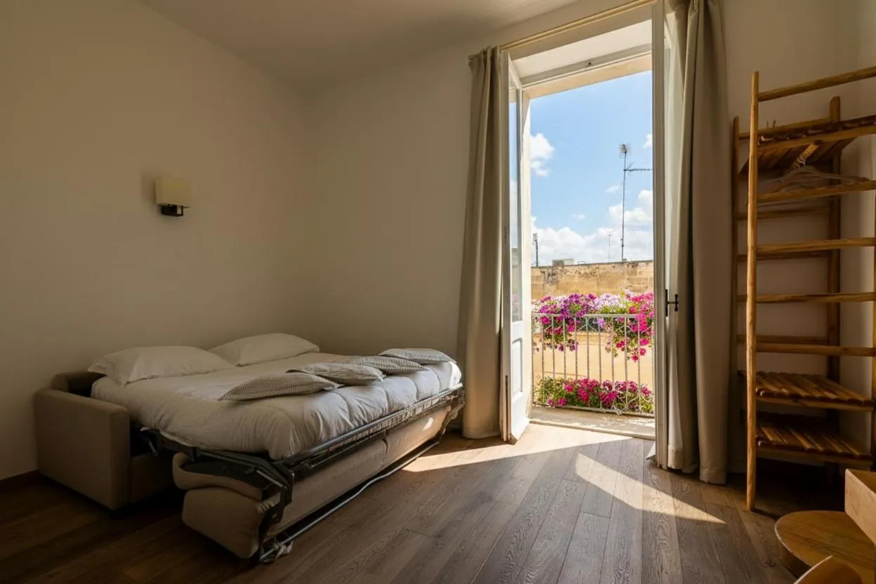 Bed in B&B Il Palazzotto di Luca Luxury Suites
