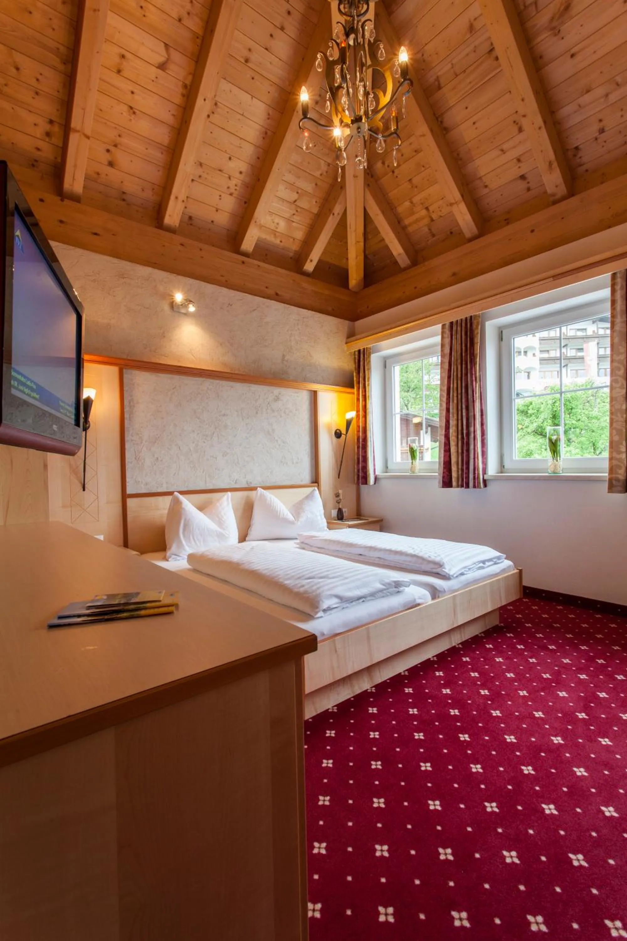 TV and multimedia, Bed in ALPENAPART LADIS ehemals Alpenapart Alexander