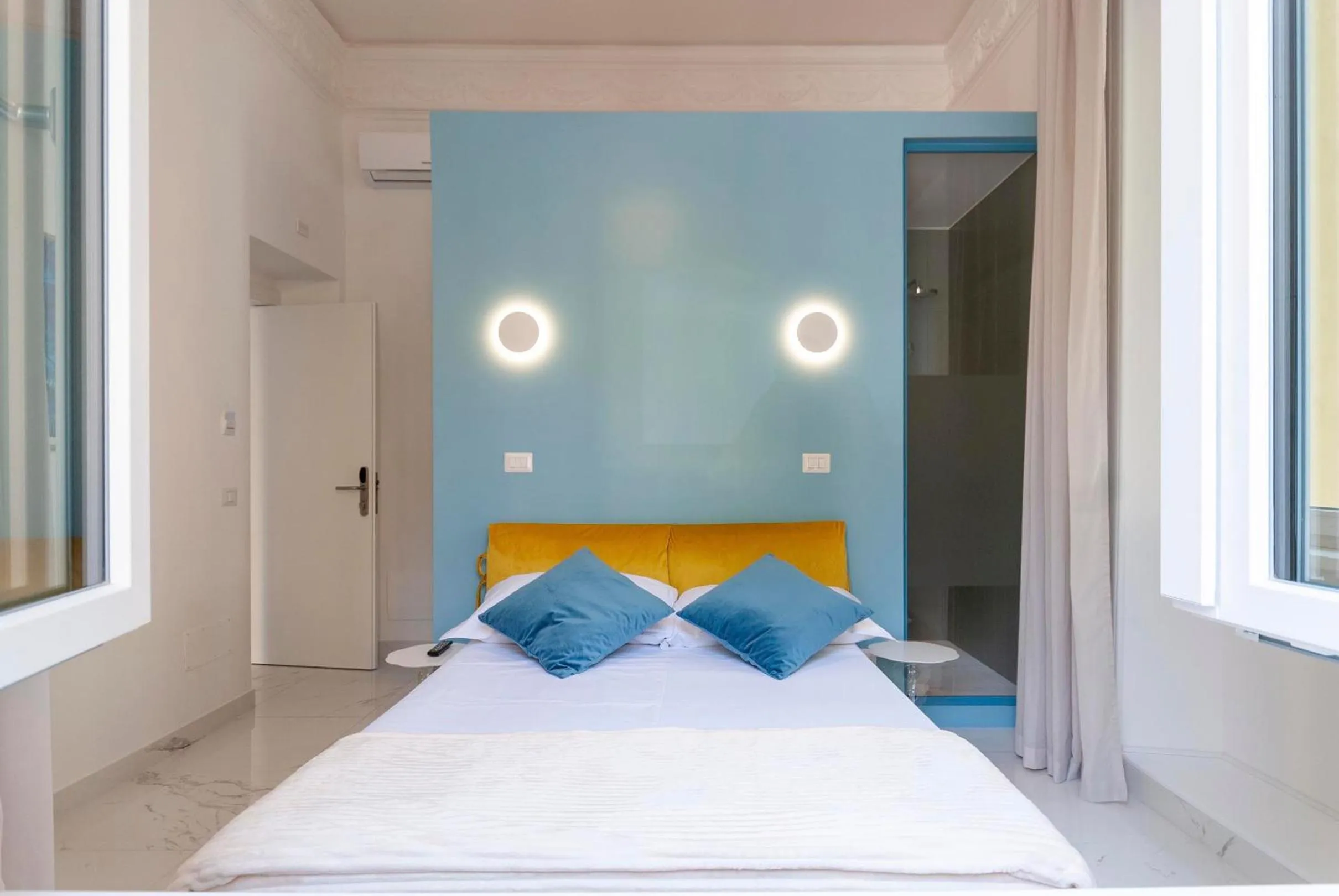 Bed in Bea Suites Luxury Rooms