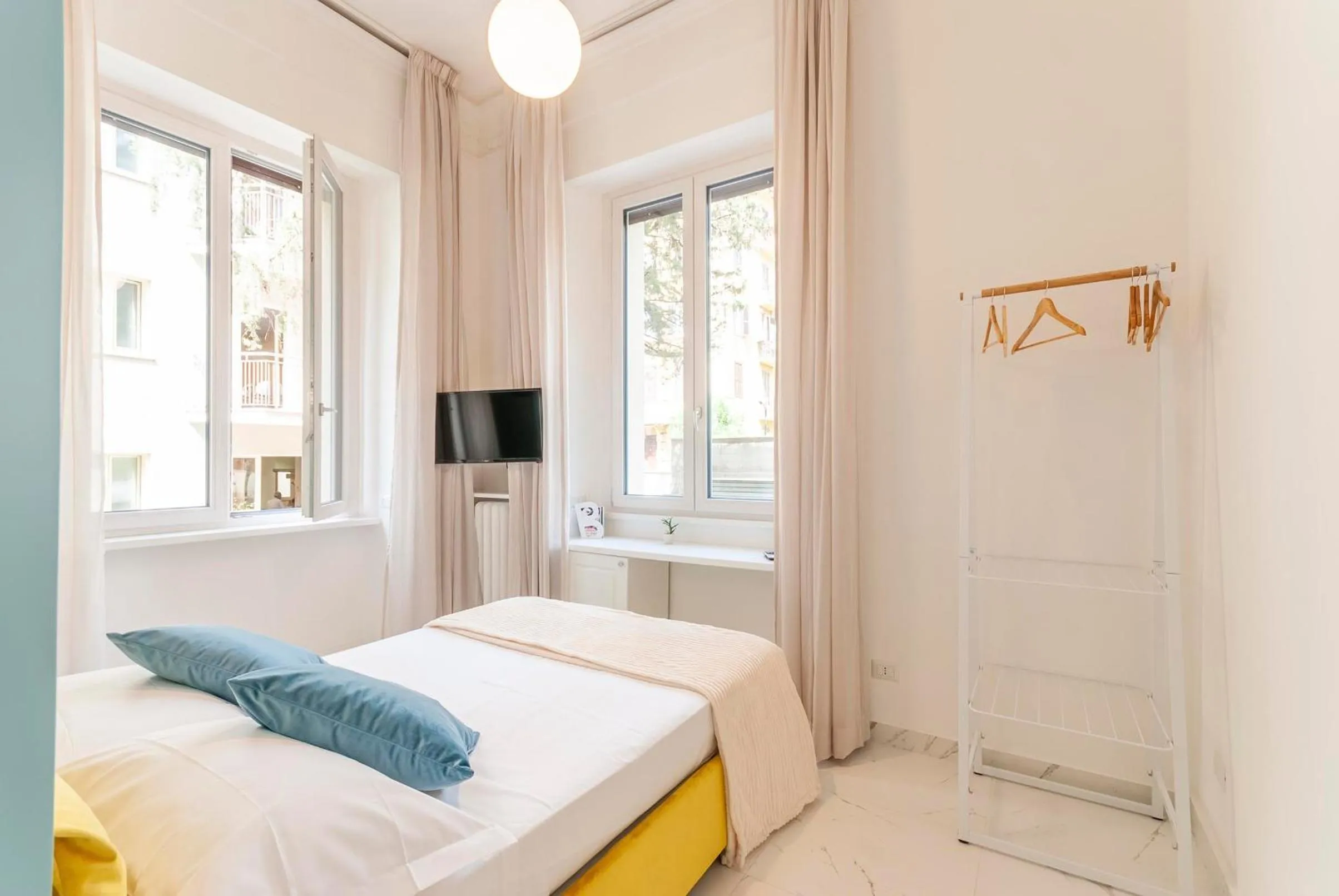 Bed in Bea Suites Luxury Rooms