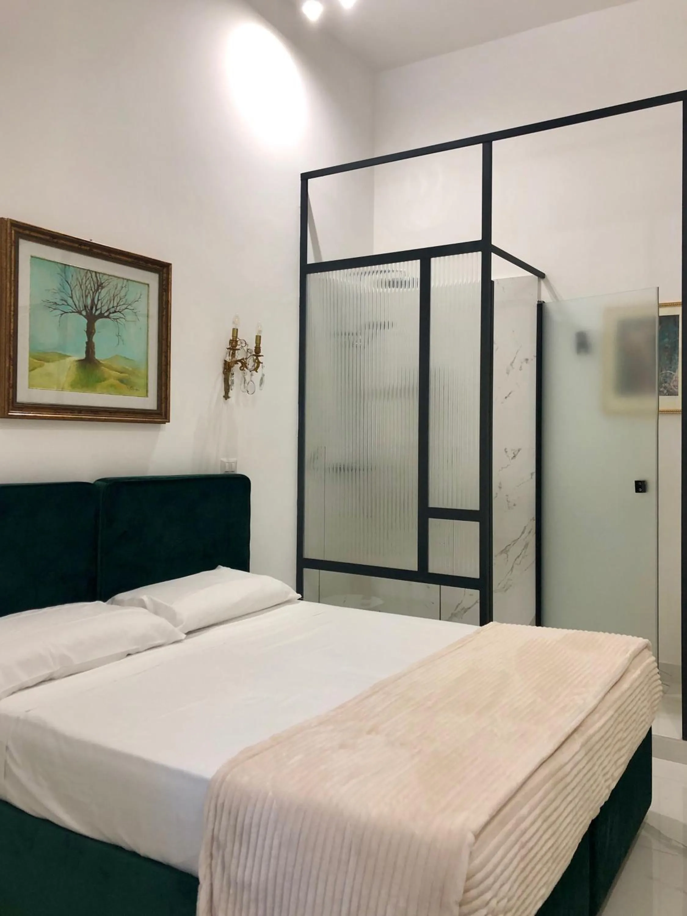 Bed in Bea Suites Luxury Rooms