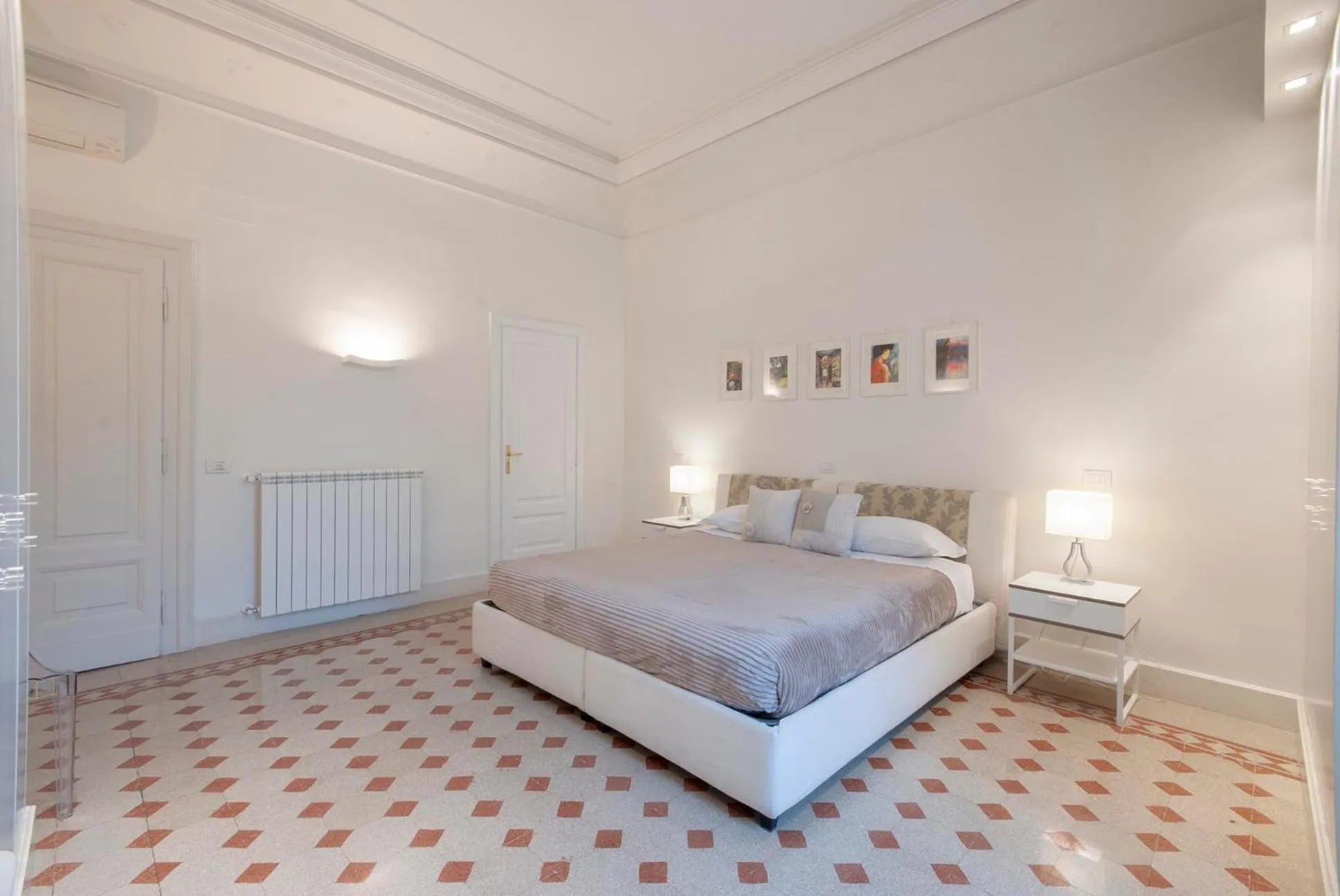 Bed in Bea Suites Luxury Rooms