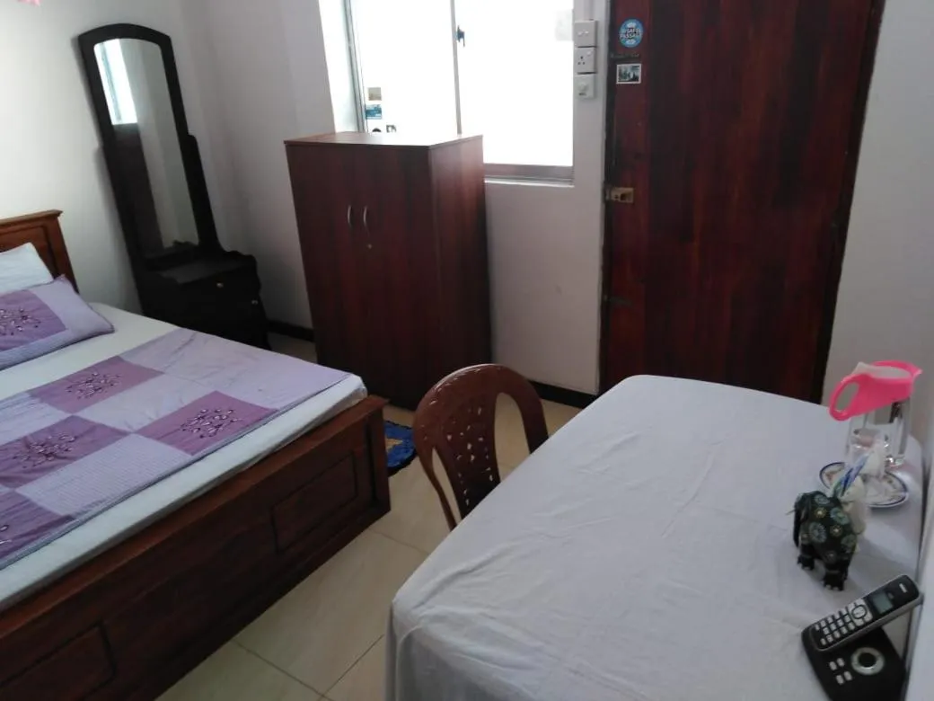 Bed in Jayanthi Surf Dreams