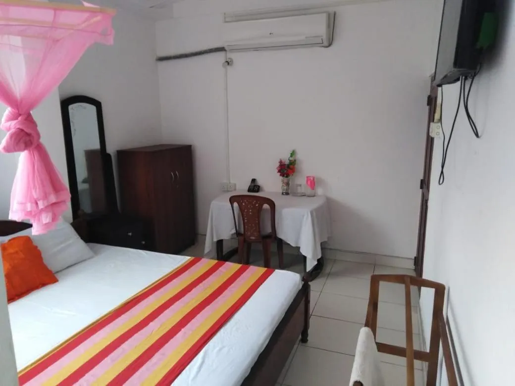 Bed in Jayanthi Surf Dreams