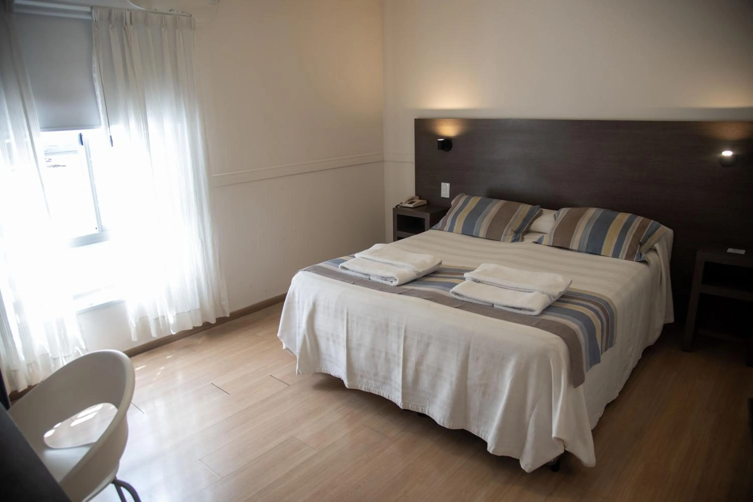 Bed in Abril Hotel Boutique