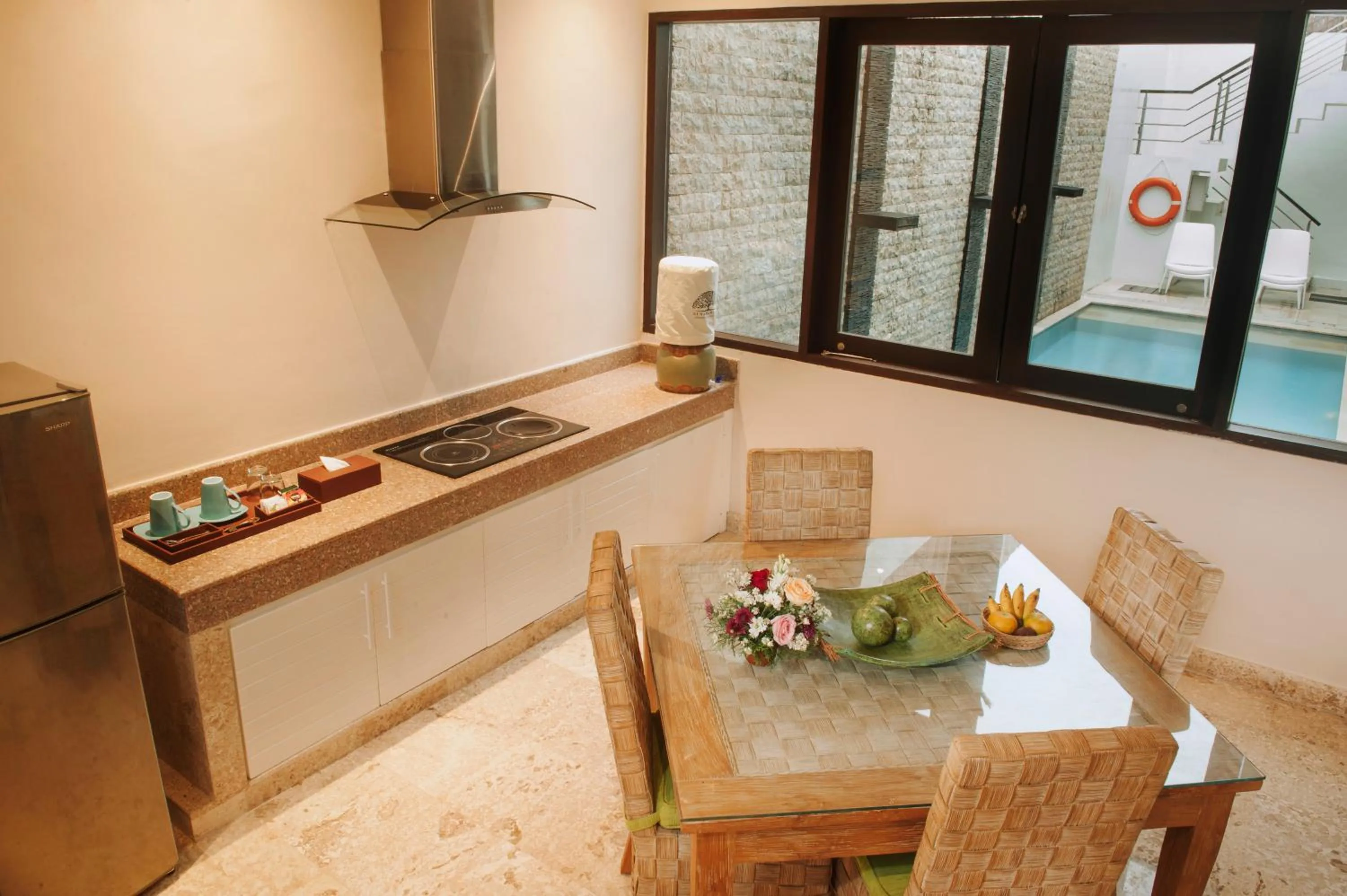 Kitchen or kitchenette in Nunamkhalu Private Villa and Spa