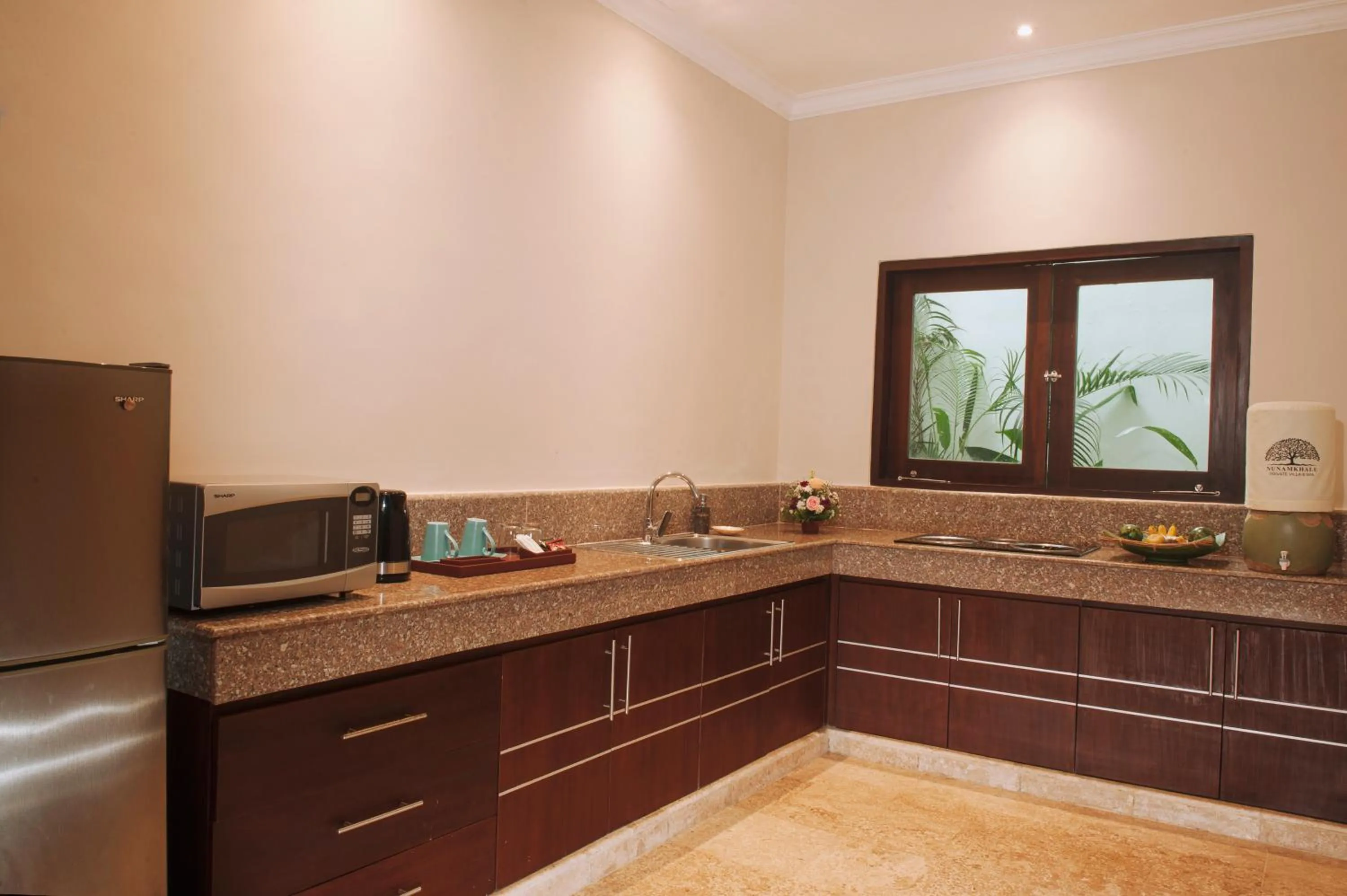 Kitchen or kitchenette in Nunamkhalu Private Villa and Spa