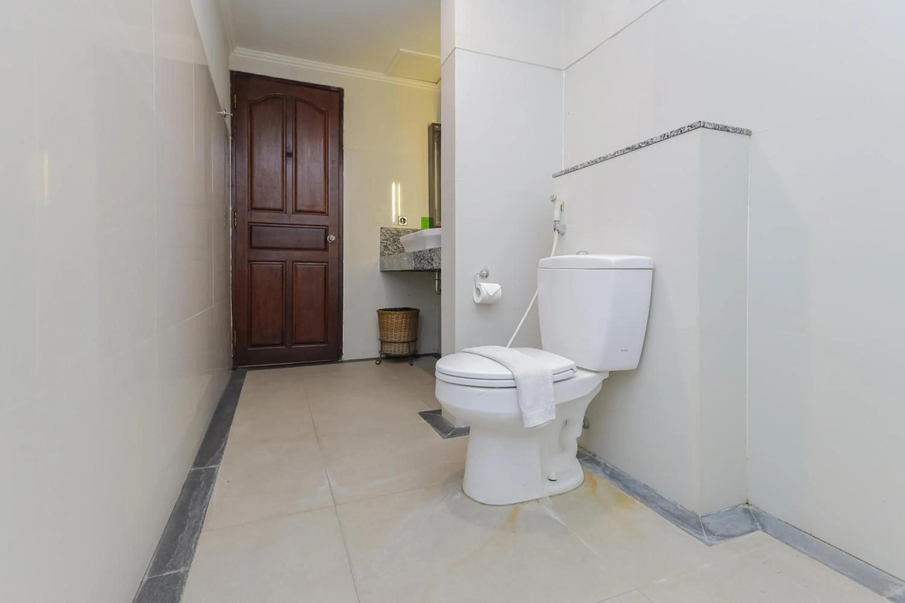 Bathroom in Urbanview Hotel Taman Suci Denpasar Bali