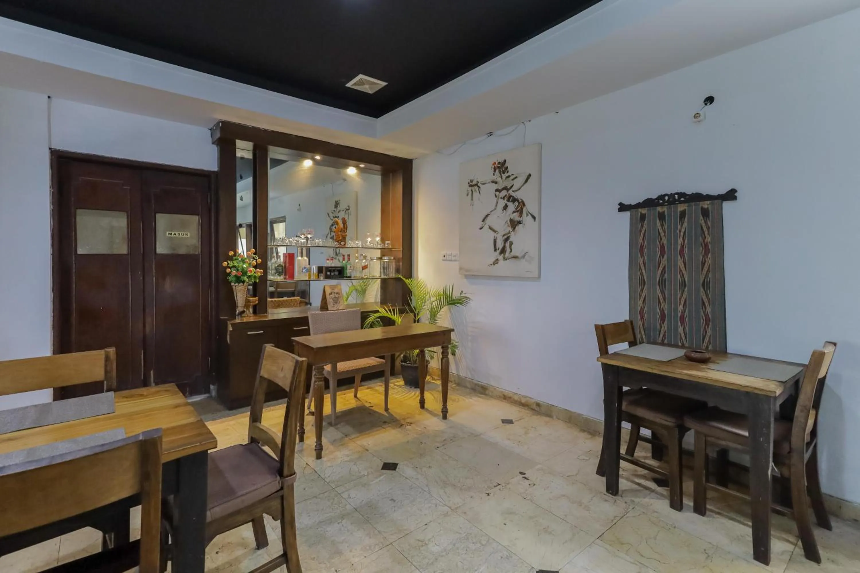 Seating area in Urbanview Hotel Taman Suci Denpasar Bali