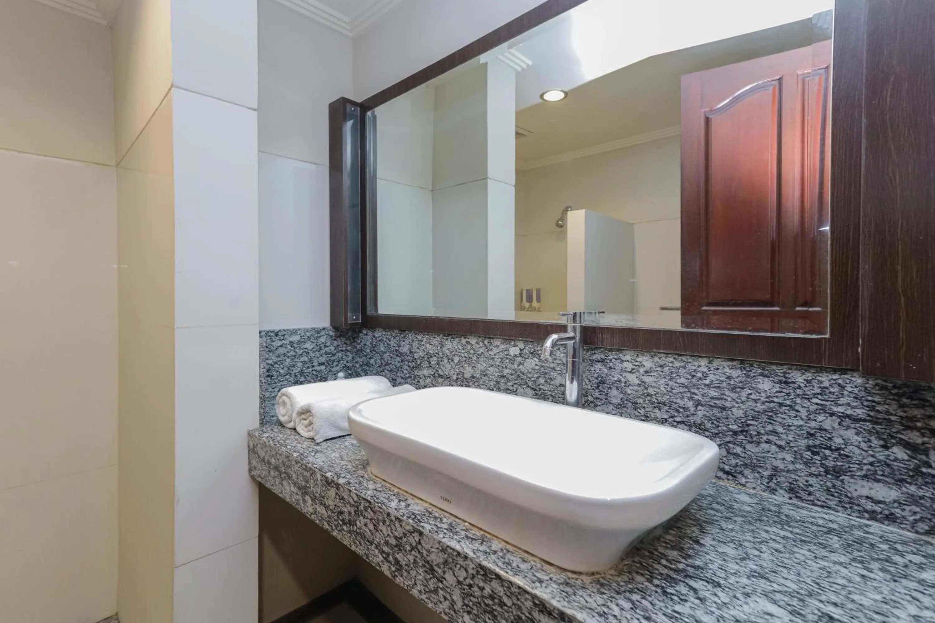 Bathroom in Urbanview Hotel Taman Suci Denpasar Bali