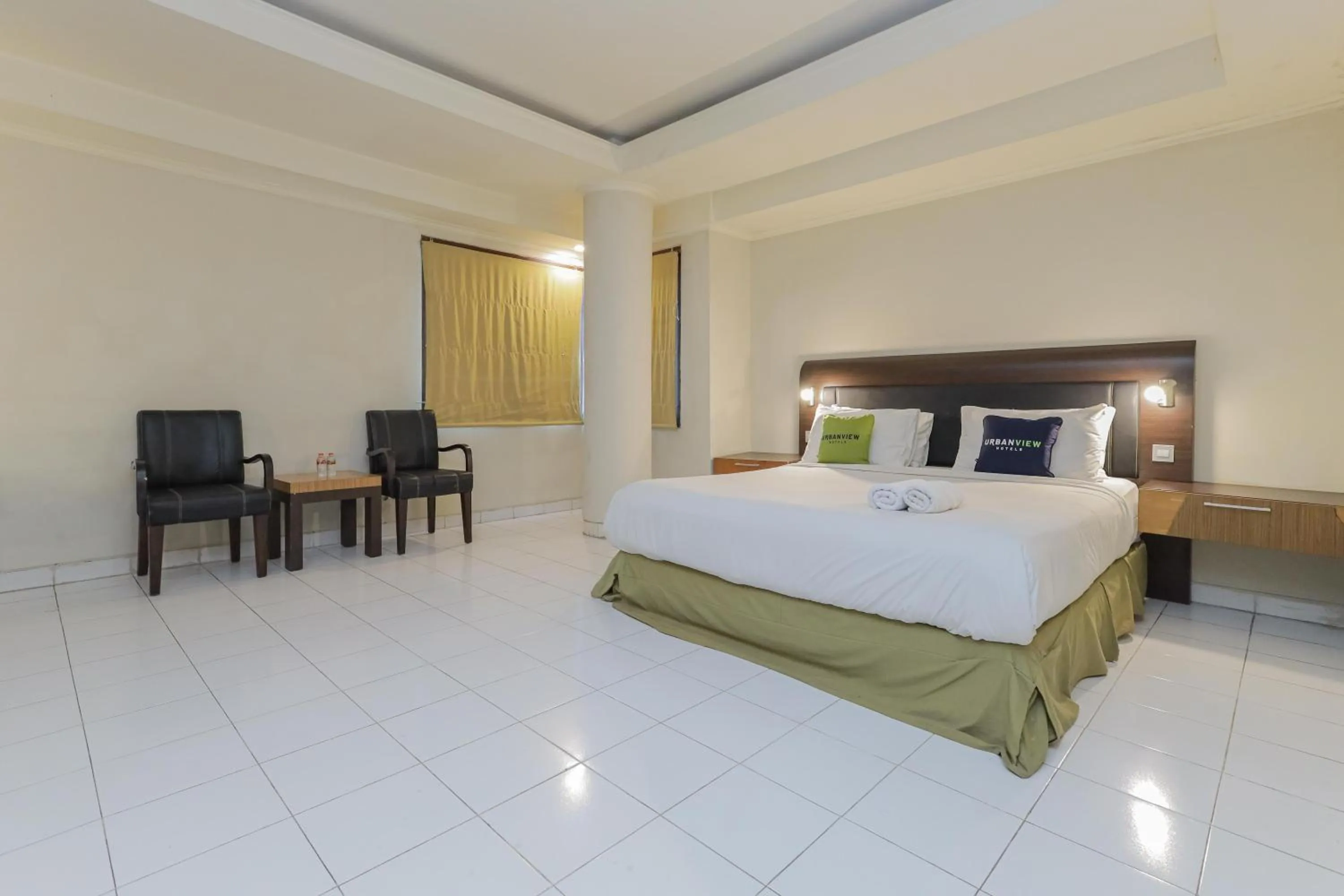 Bedroom, Bed in Urbanview Hotel Taman Suci Denpasar Bali