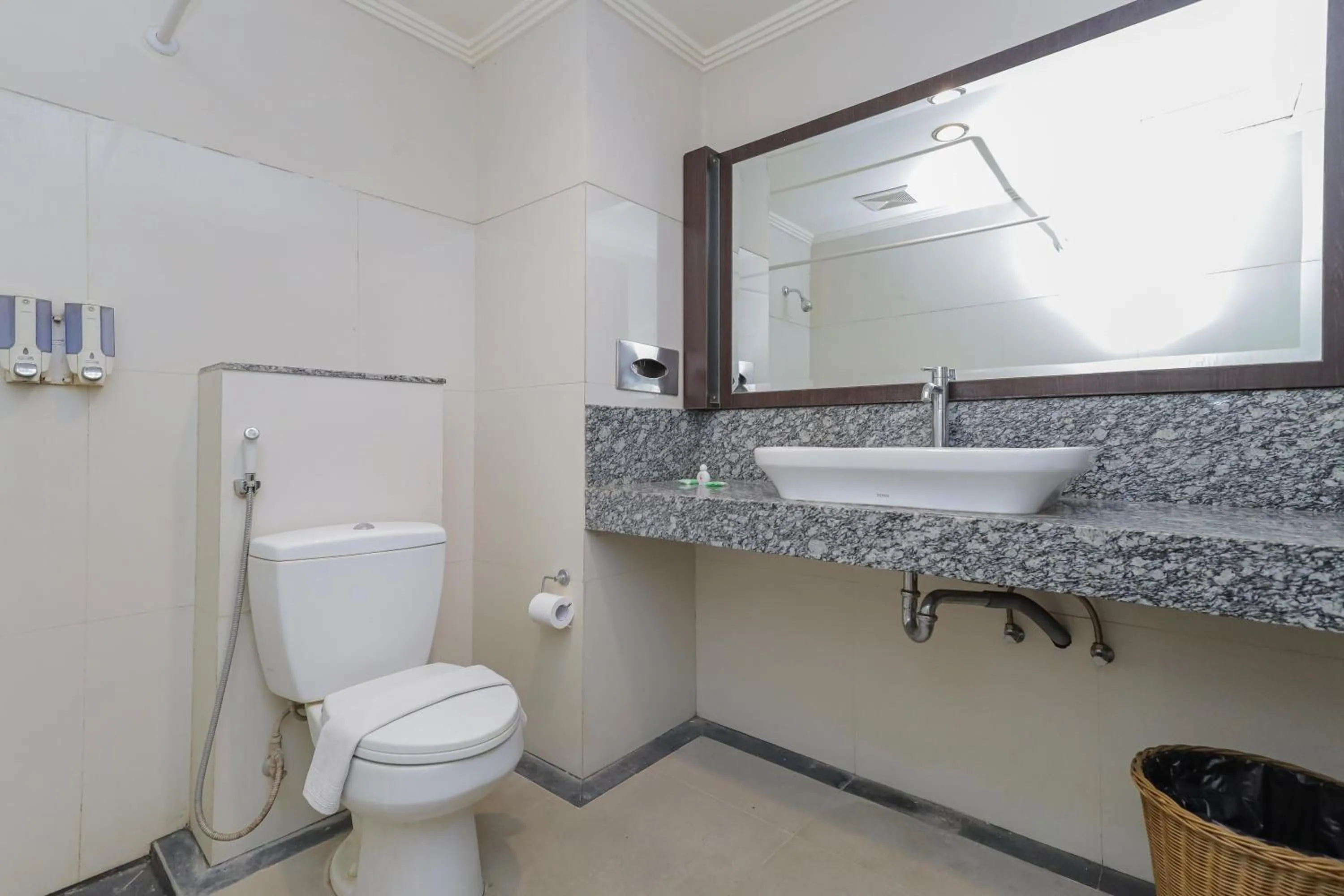 Bathroom in Urbanview Hotel Taman Suci Denpasar Bali