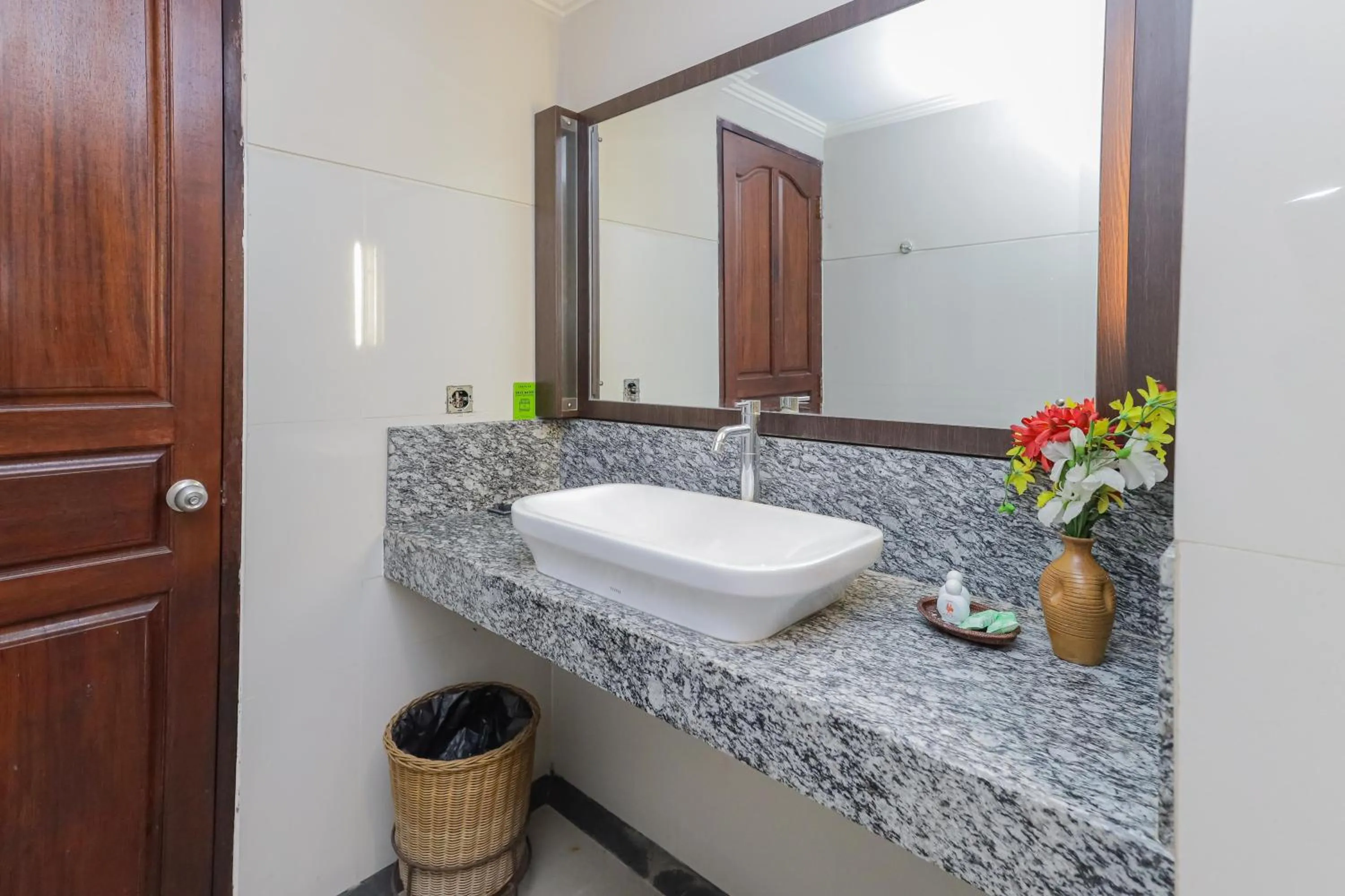 Bathroom in Urbanview Hotel Taman Suci Denpasar Bali