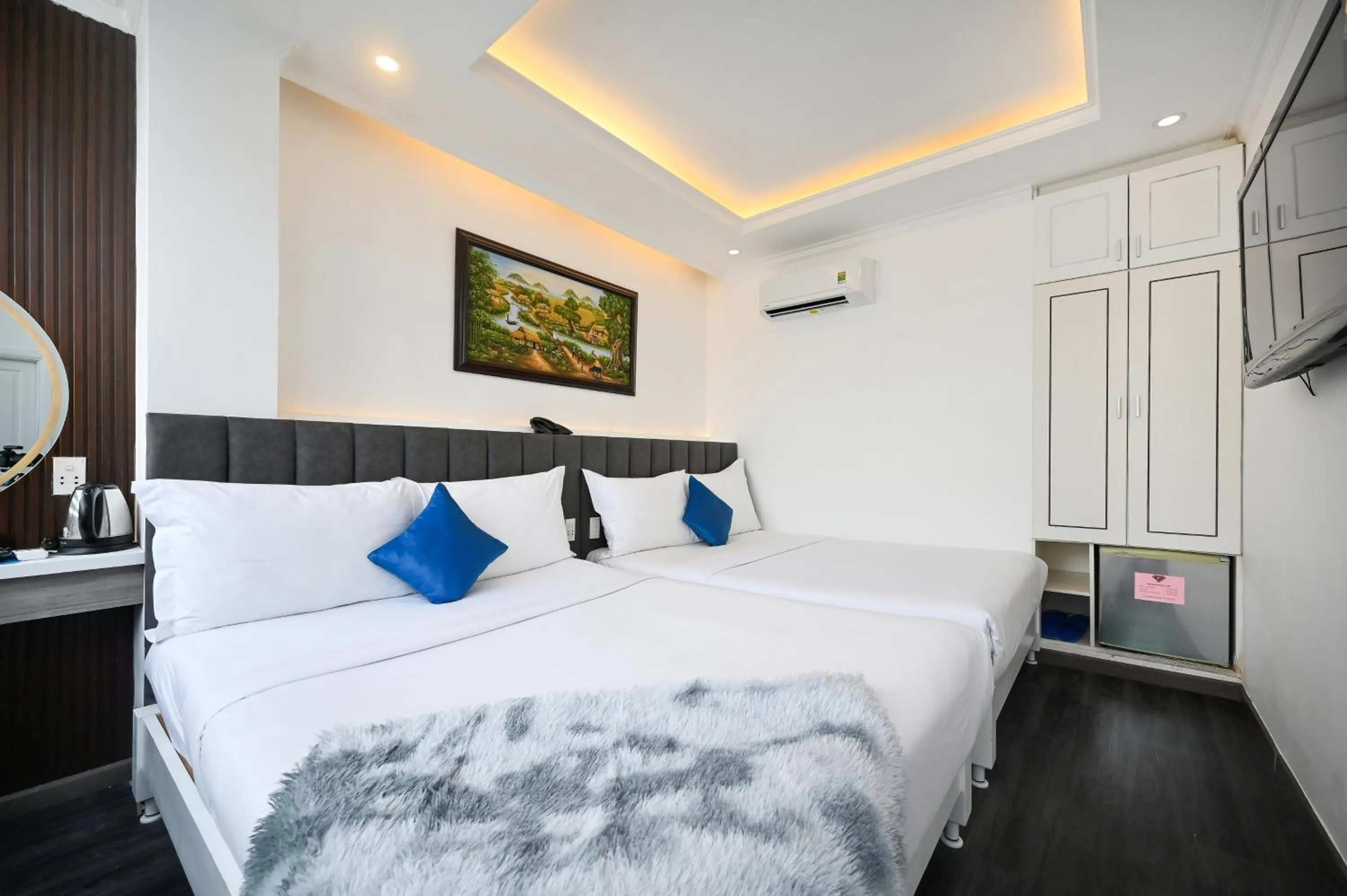 Photo of the whole room, Bed in Ruby Saigon Hotel - Ben Thanh