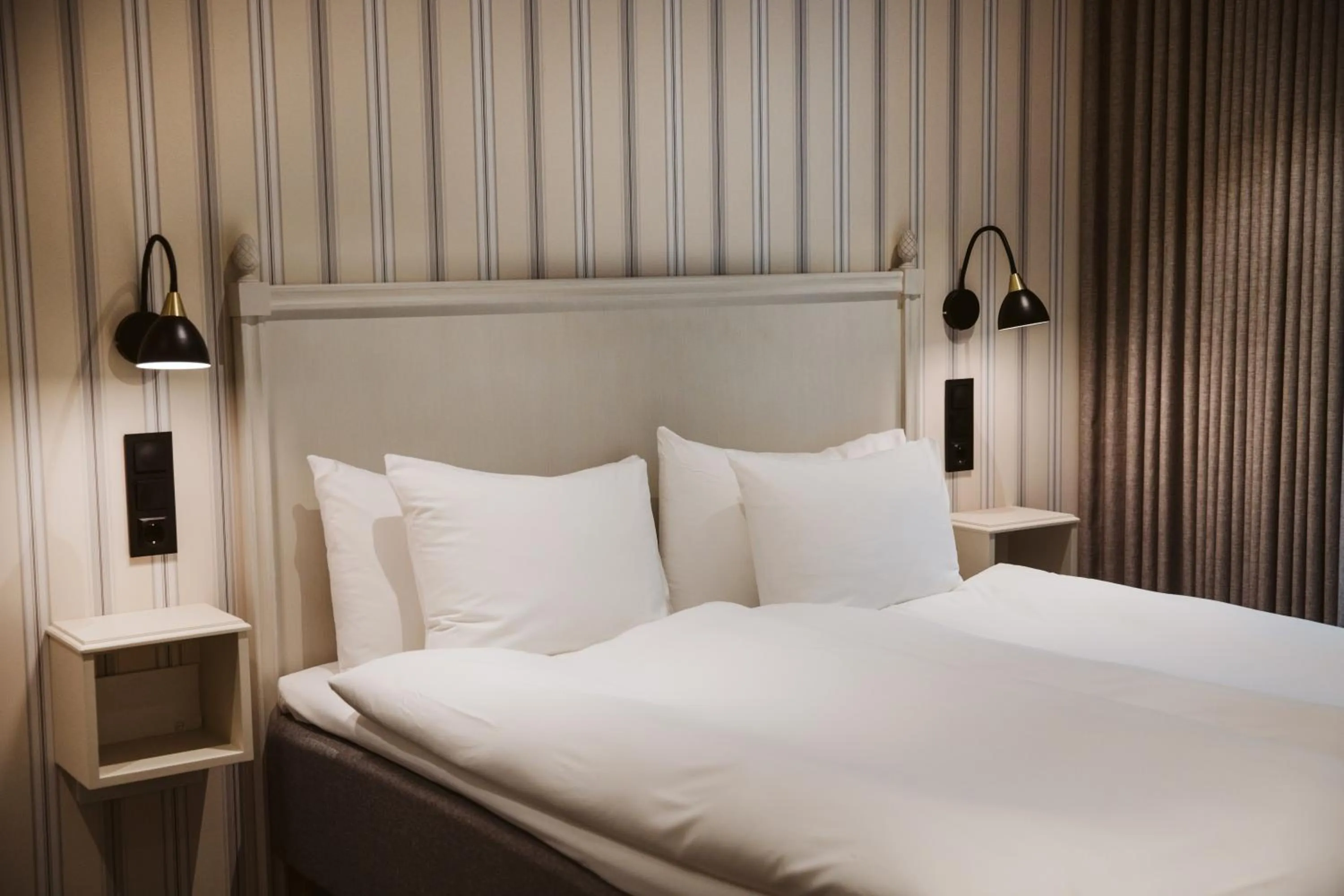 Bed in Hotel Rusthållargården