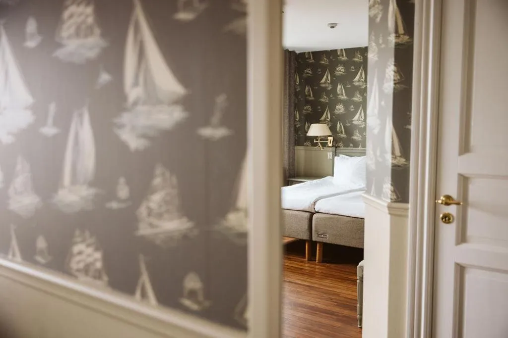 Bed in Hotel Rusthållargården