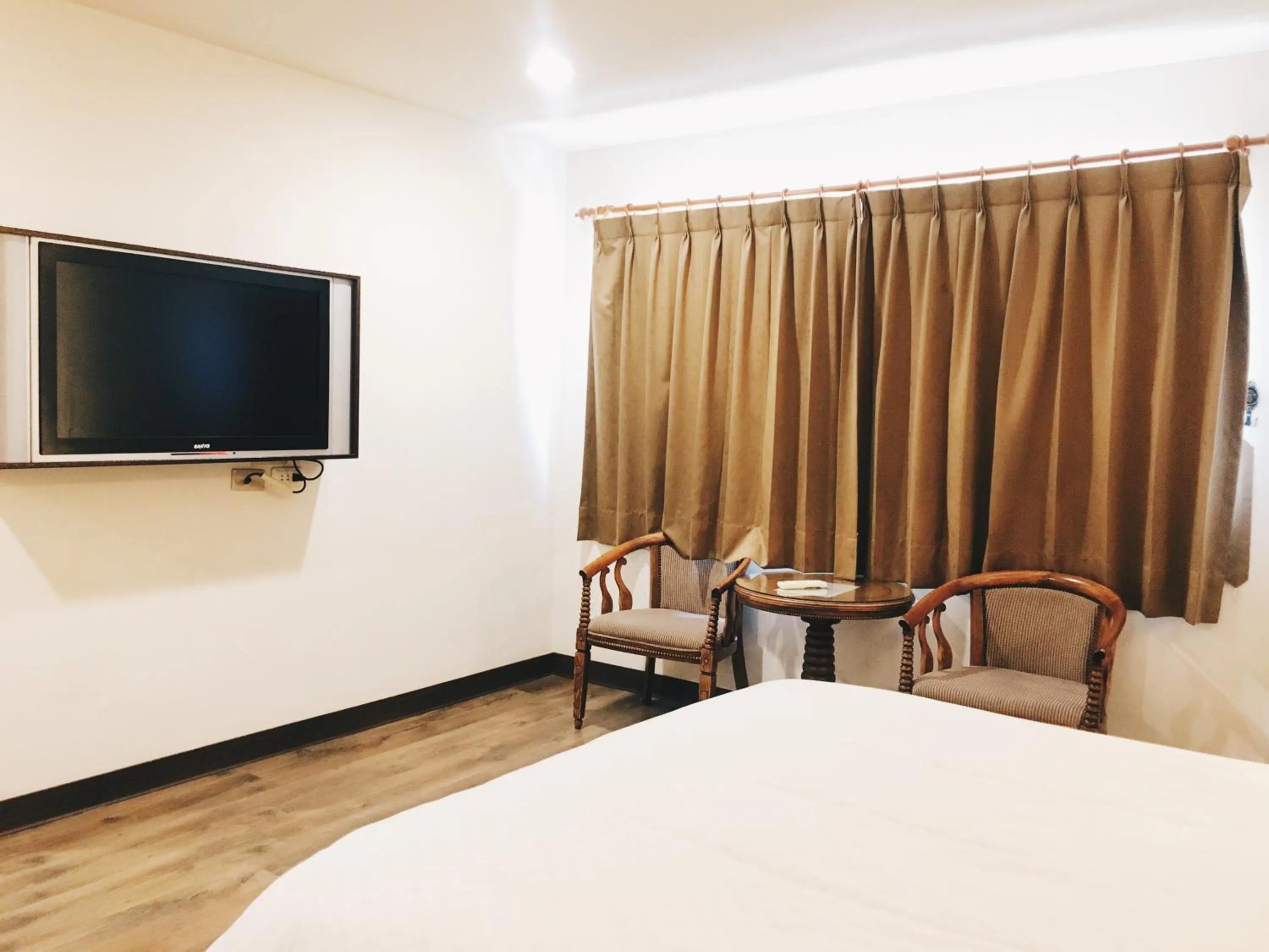 Bed in Hua Tai Hotel