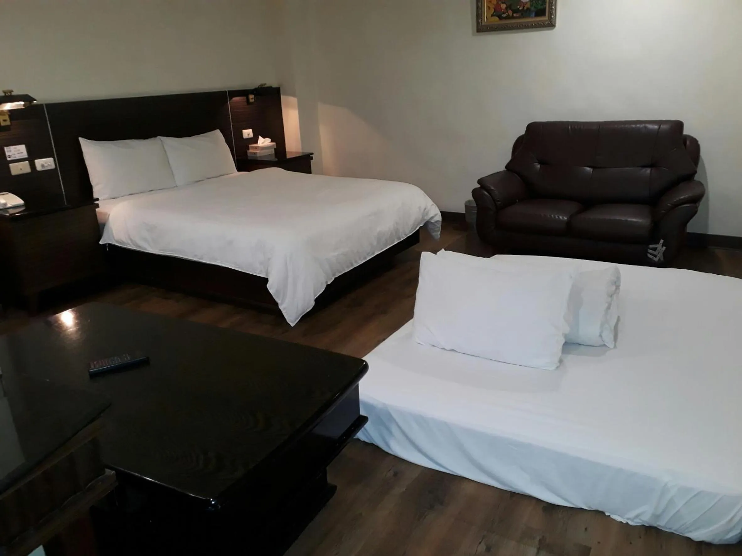 Bed in Hua Tai Hotel